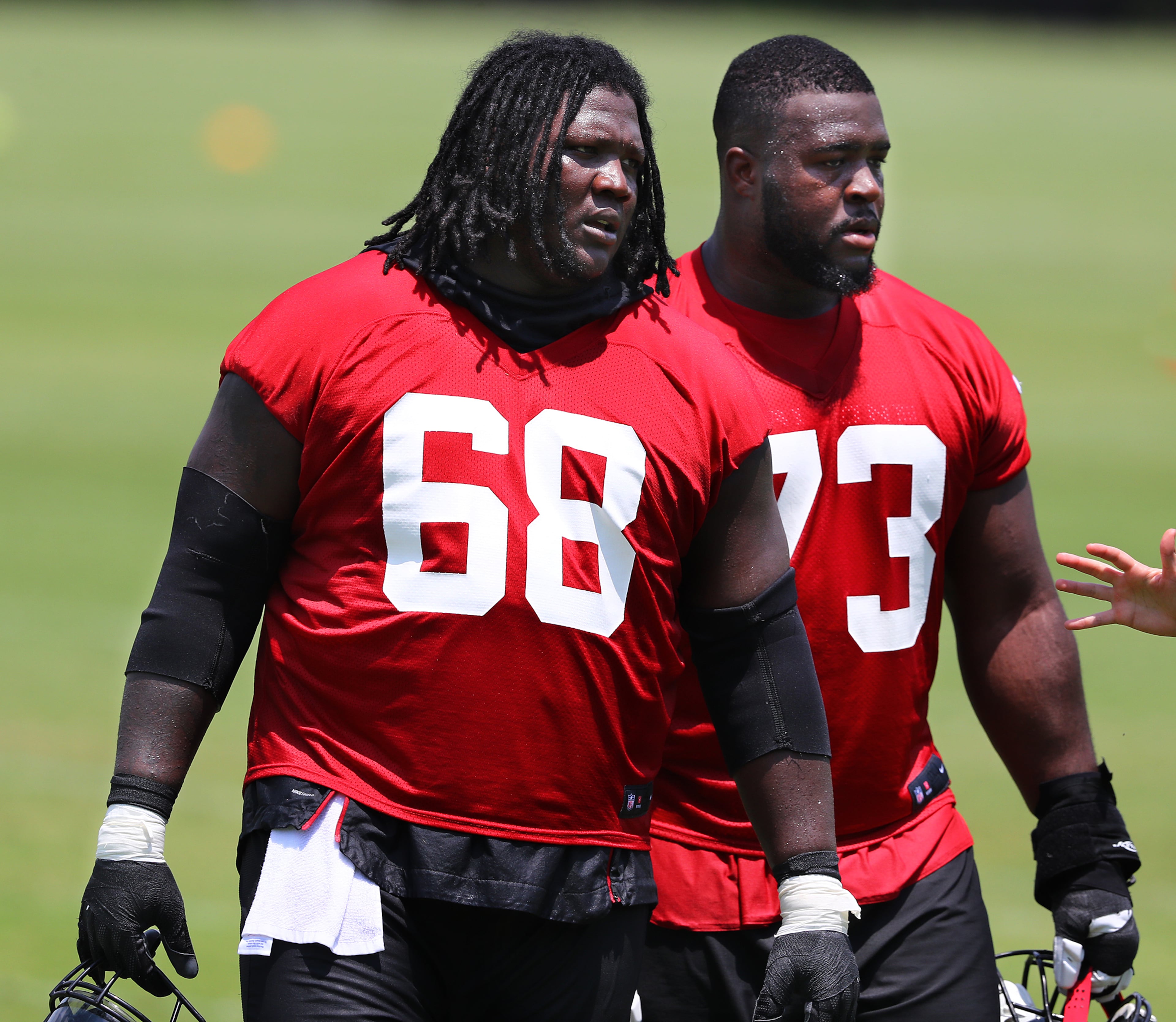 Falcons guard Jamon Brown (left) and tackle Matt Gono. Curtis Compton/ccompton@ajc.com