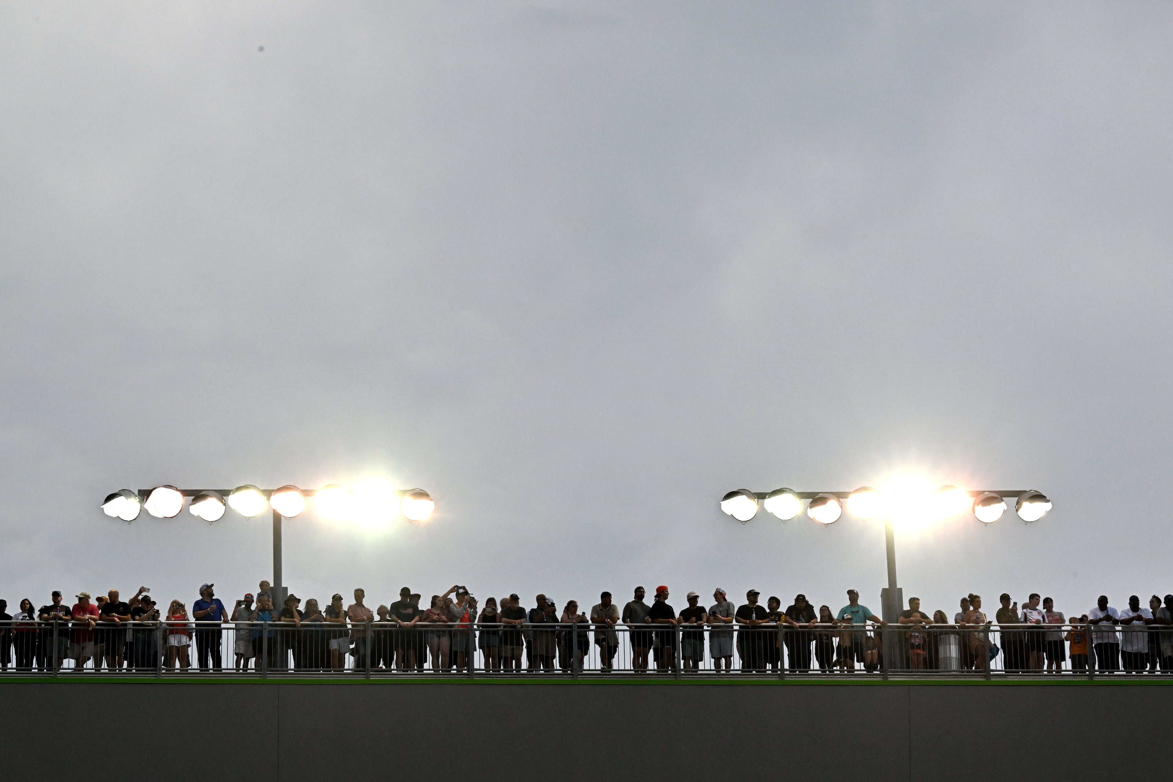 NASCAR fans watch the start of Quaker State 400 NASCAR Cup Series race at EchoPark Speedway, Saturday, June 28, 2025, in Hampton. (Hyosub Shin / AJC)