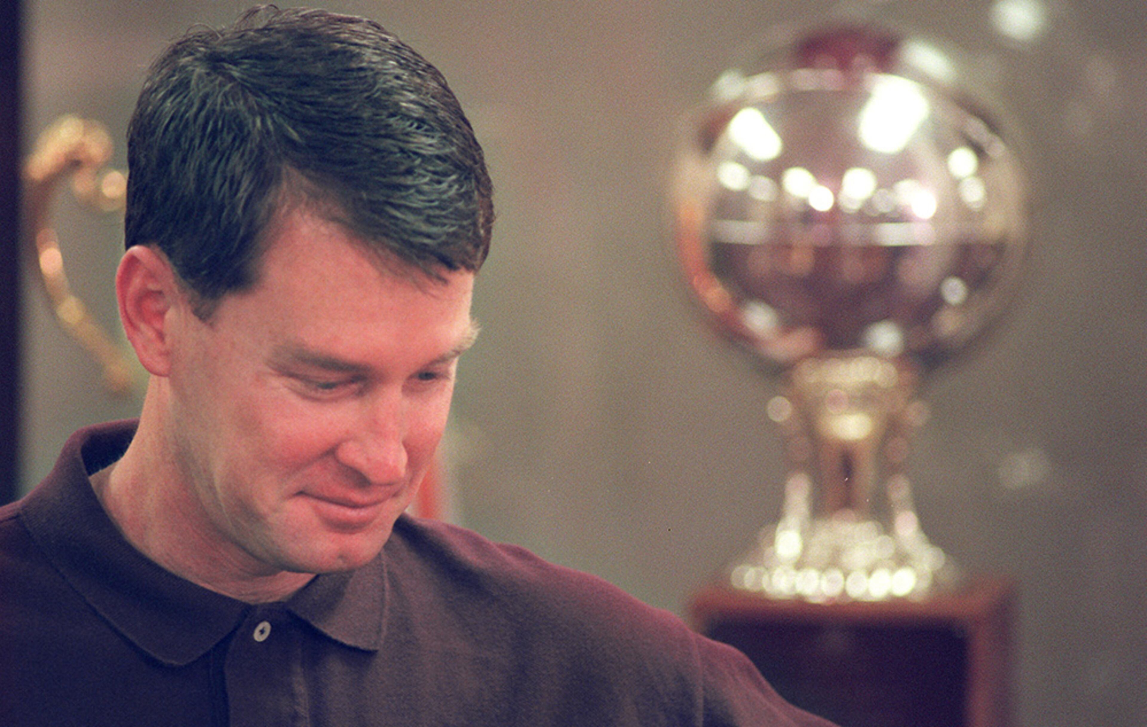 Former Georgia Tech great and NBA veteran Mark Price pauses as he is being introduced in a press conference at Alexander Memorial Coliseum by Bobby Cremins to announce the retirement of the shooting guard after 12 years in the NBA.