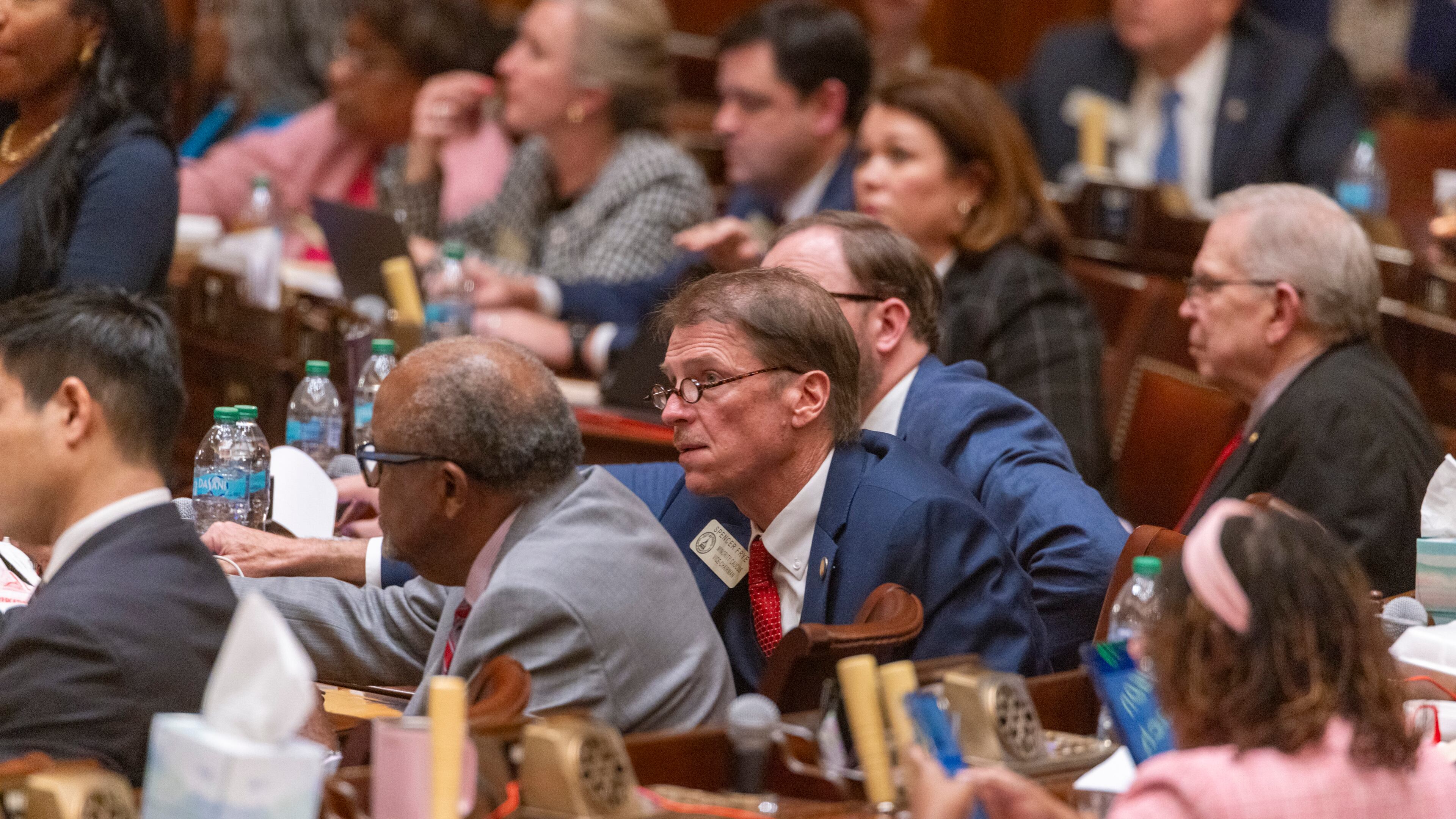 State representatives, including Rep. Spencer Frye, D-Athens, vote on House Bill 951, regarding health benefit policy coverage for medically necessary orthotic and prosthetic devices,
at the Capitol in Atlanta on Crossover Day, Friday, March 6, 2026. (Arvin Temkar/AJC)