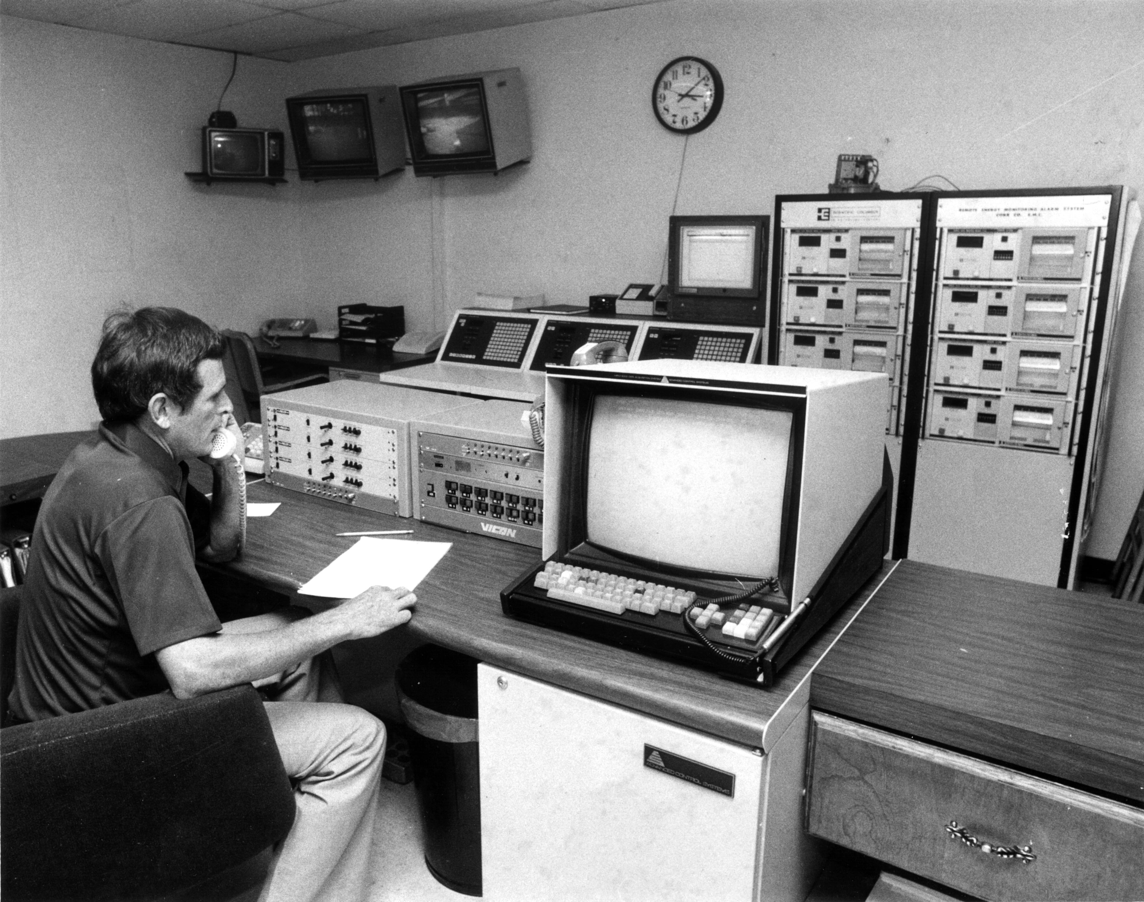 Cobb Electric Membership Corp power control technician Tom Hutto watches the dials closely during peak months in 1979.