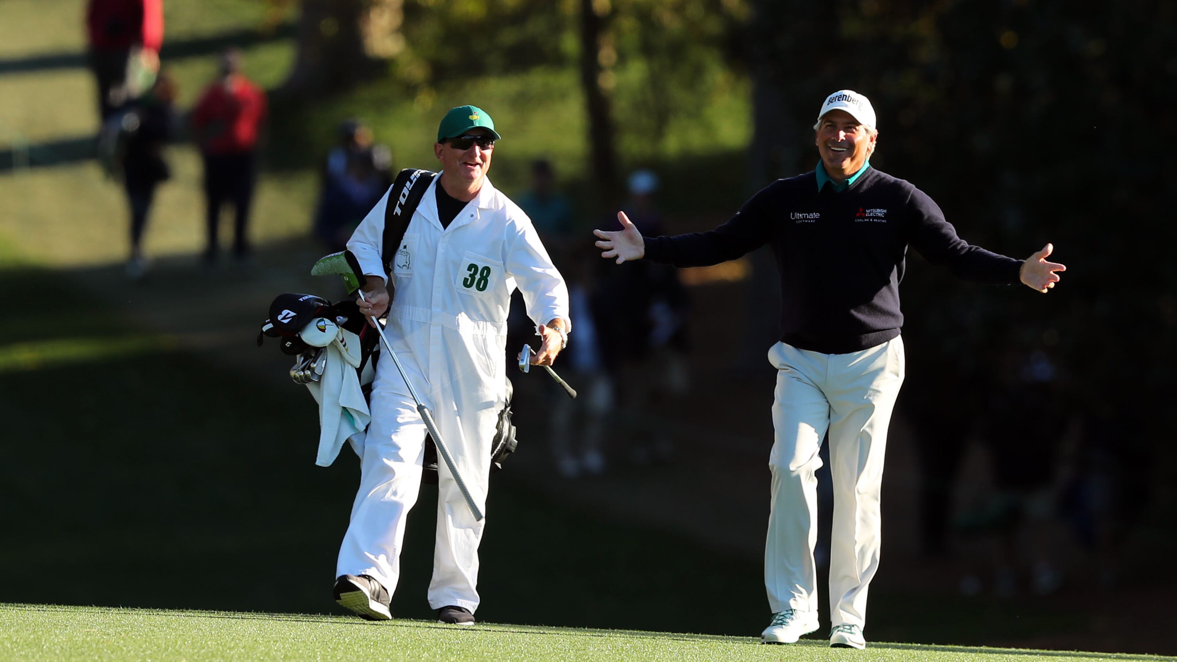 Fred Couples exults over hitting it close on No. 18 Friday at the Masters. His birdie there completed a second-round 70. (Curtis Compton/ccompton@ajc.com)