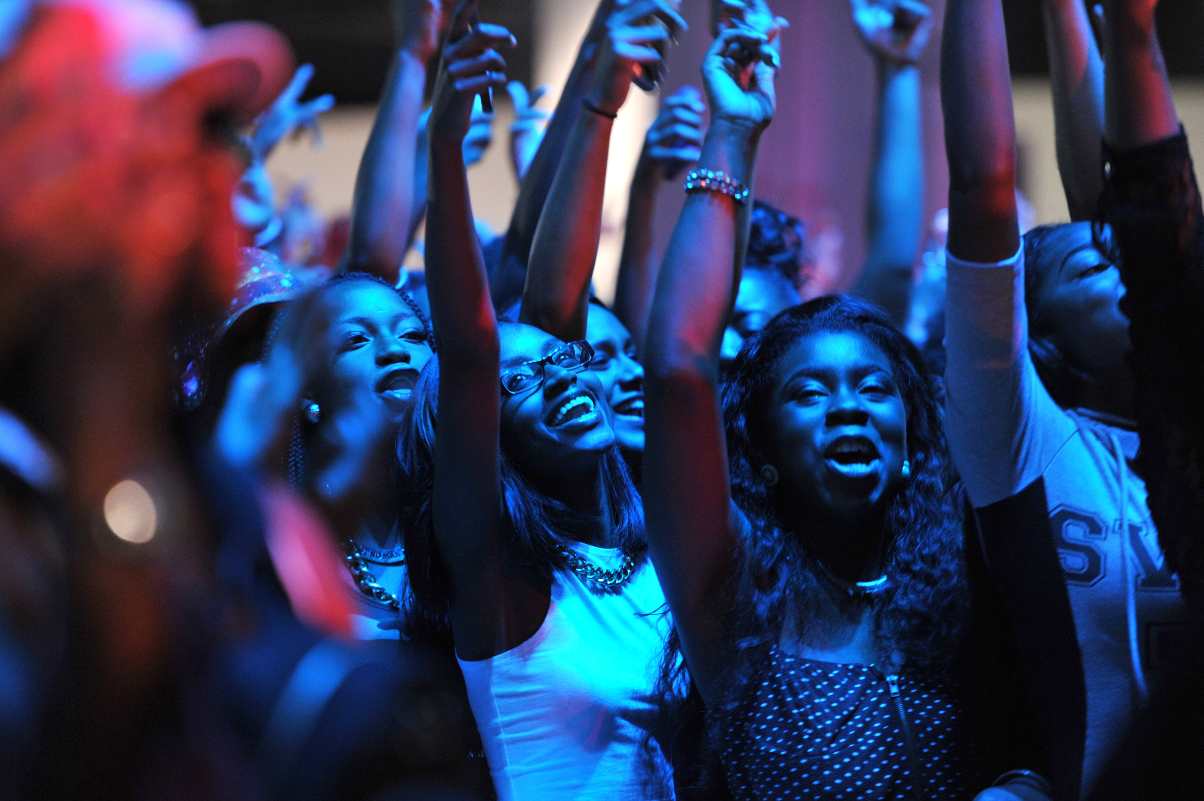 Fans get excited watching Trey Songz during The 2014 V-103/WAOK Car & Bike Show at the Georgia World Congress Center on Saturday, July 12, 2014.
