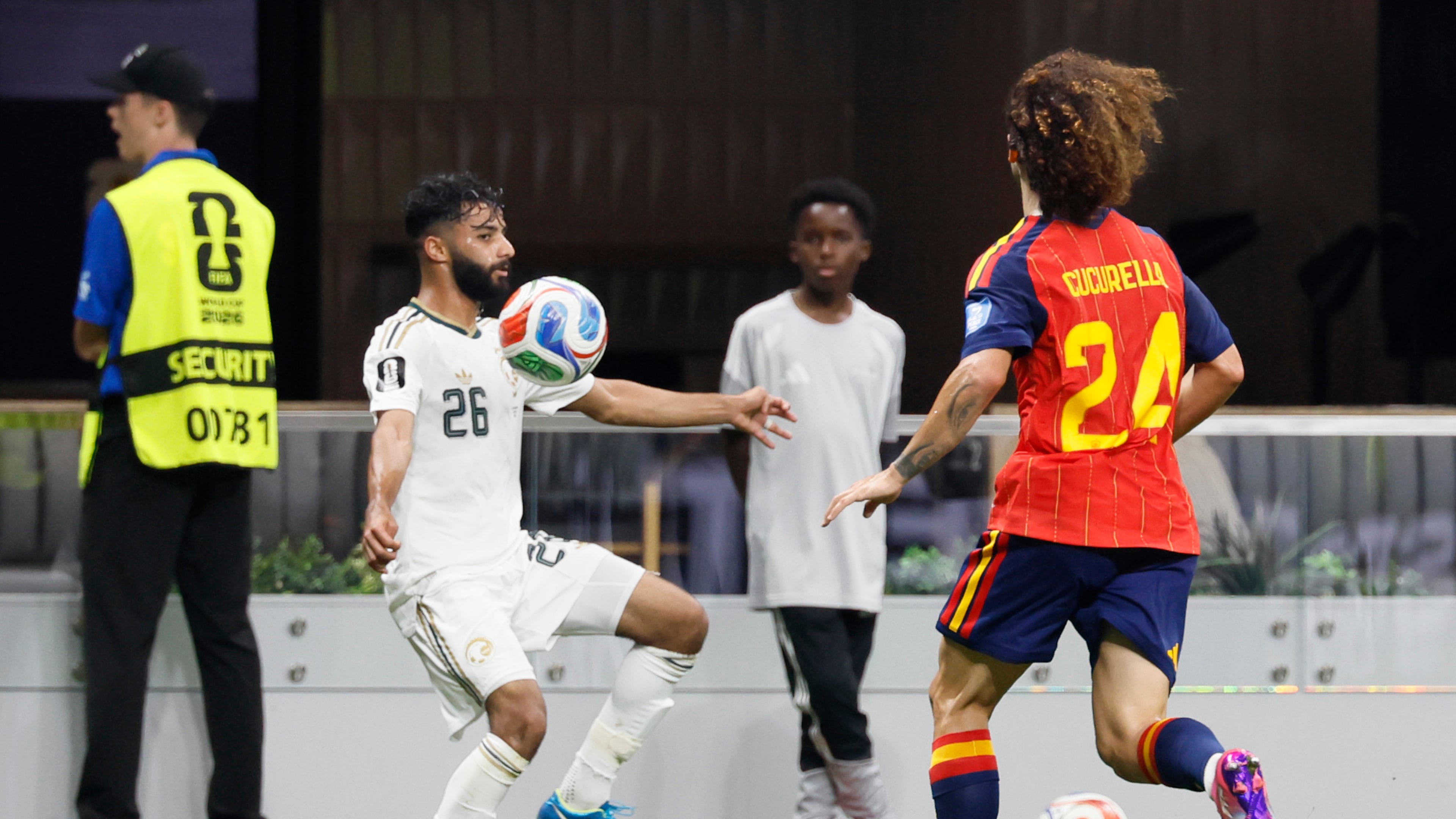 Saudi Arabia's Mohammed Abu Alshamat (left) controls the ball against Spain's Marc Cucurella during second half of the Spain vs. Saudia Arabia World Cup match at Atlanta Stadium on Sunday, June 21, 2026. (Miguel Martinez/AJC)