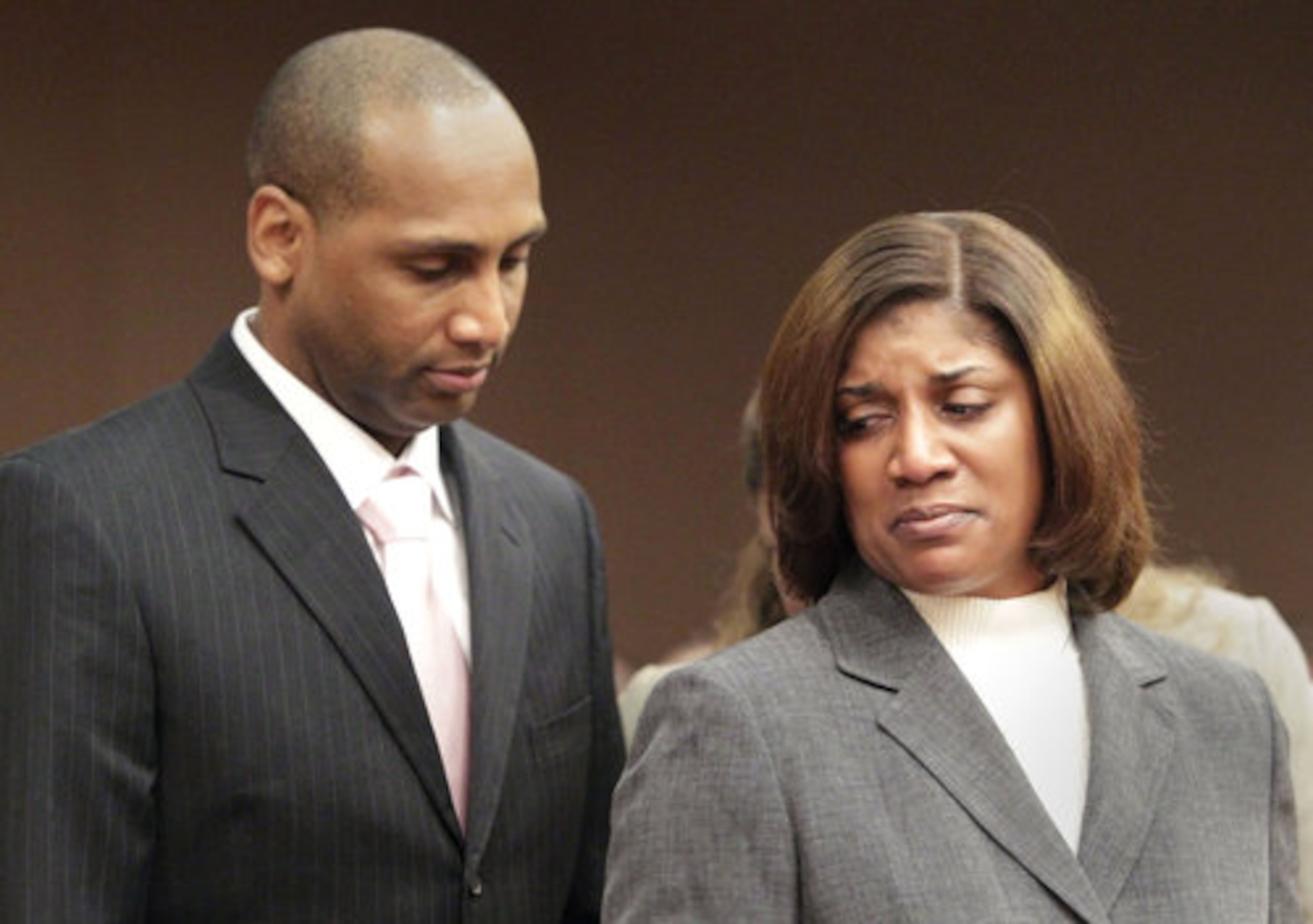 Morris and Tracie Johnson stood together while they each made statements to the court.