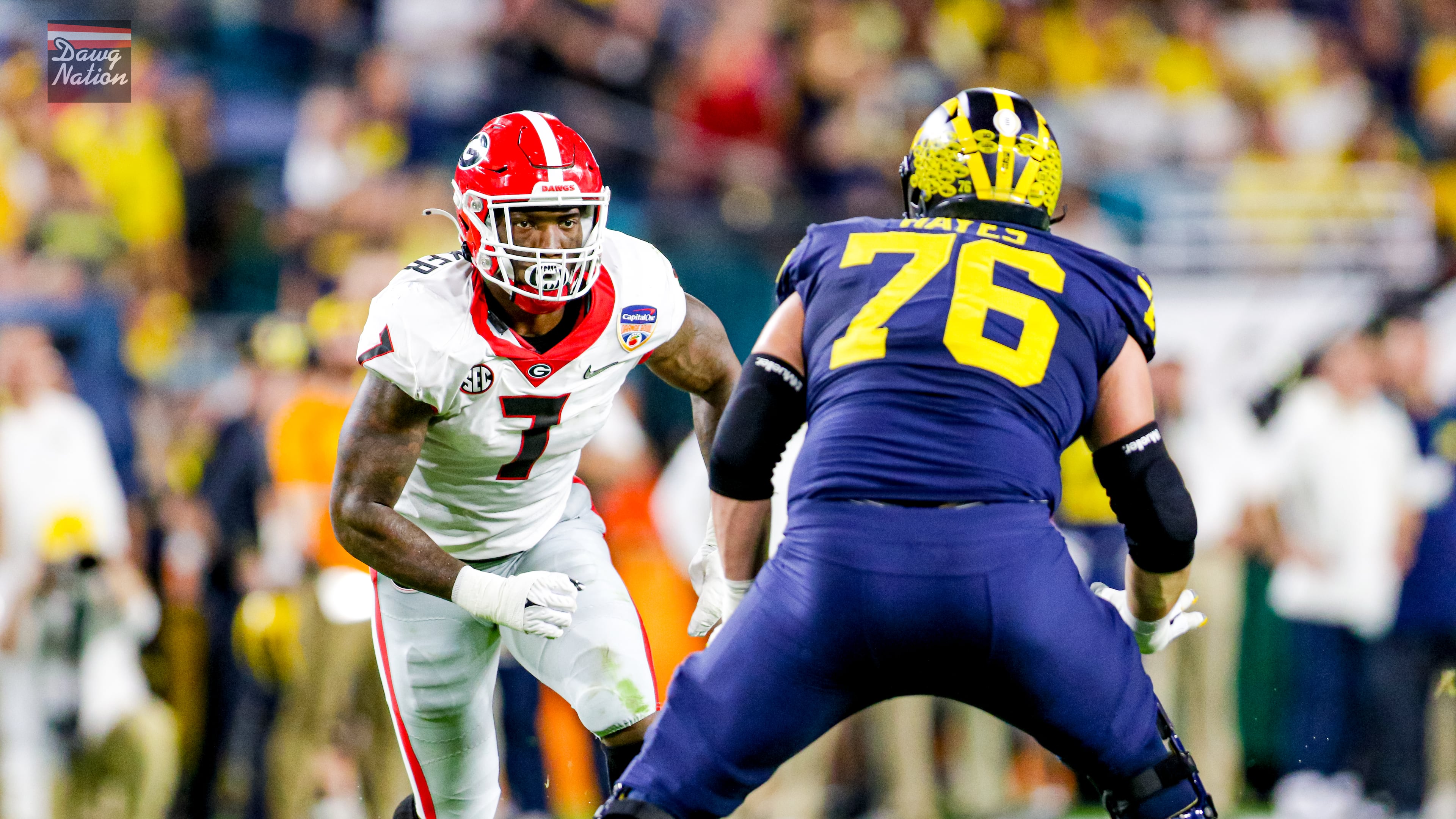 Georgia linebacker Quay Walker rushes upfield against Michigan in the Orange Bowl at Hard Rock Stadium in Miami Gardens, Florida, on Dec. 31, 2021. The Bulldogs went on to defeat Alabama in the national championship game. (Jeff Sentell/DawgNation 2021)