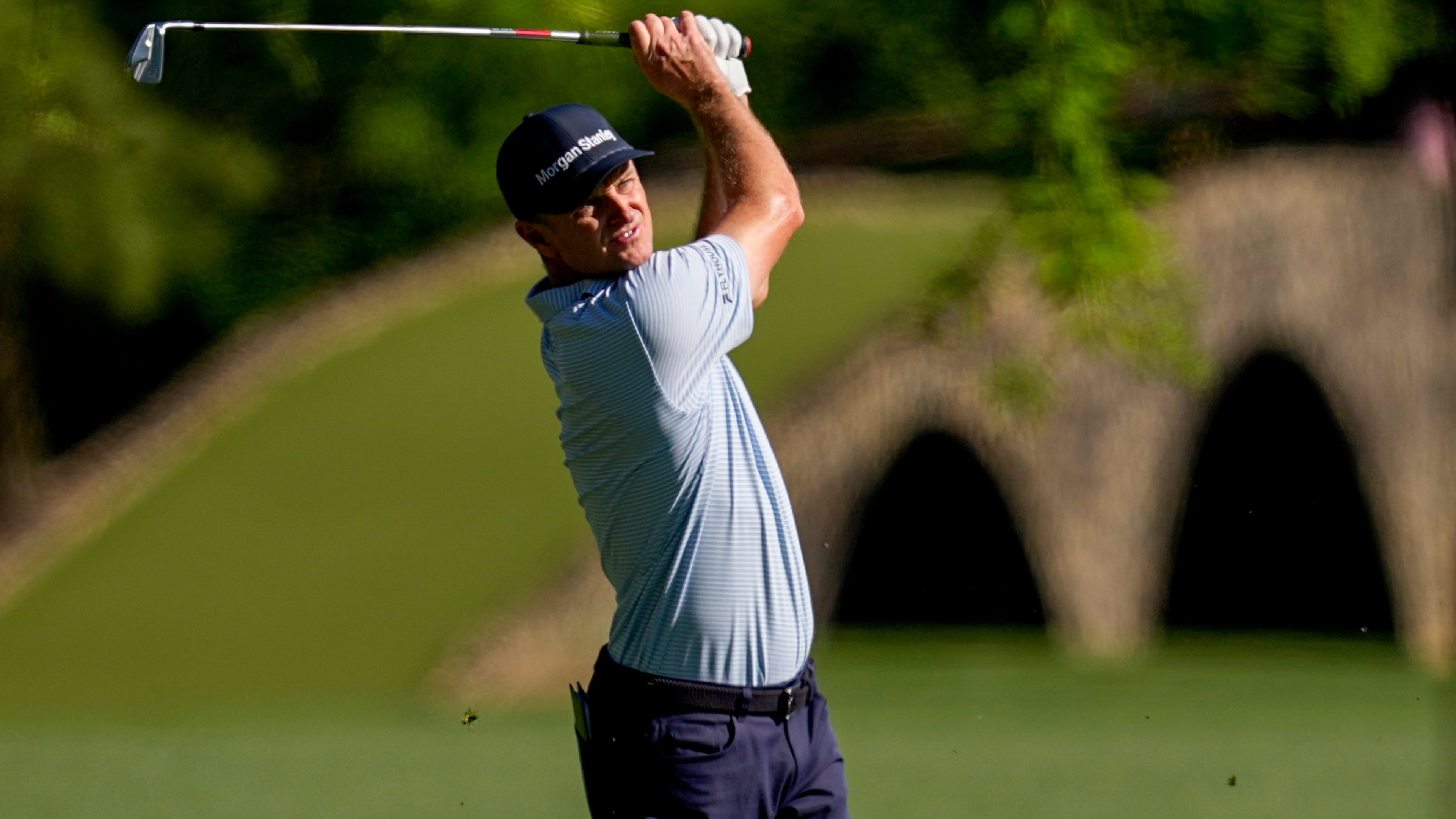 Justin Rose, of England, hits from the fairway on the 13th hole during the first round of the Masters golf tournament at the Augusta National Golf Club, Thursday, April 9, 2026, in Augusta, Ga. (AP Photo/David J. Phillip)