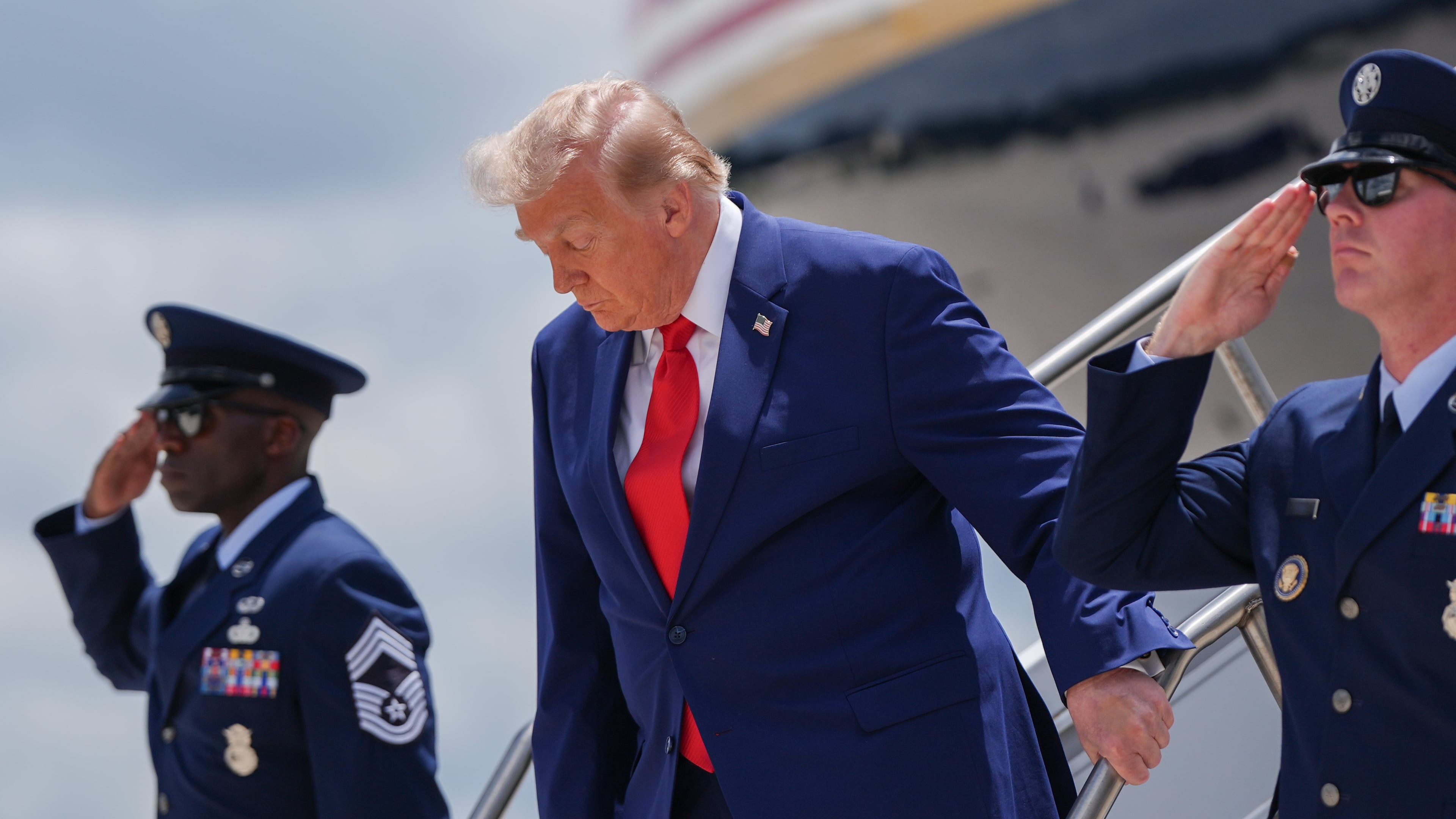President Donald Trump arrives on Air Force One at Dobbins Air Reserve Base, Wednesday, July 22, 2026, in Marietta, Ga. (AP Photo/Julia Demaree Nikhinson)