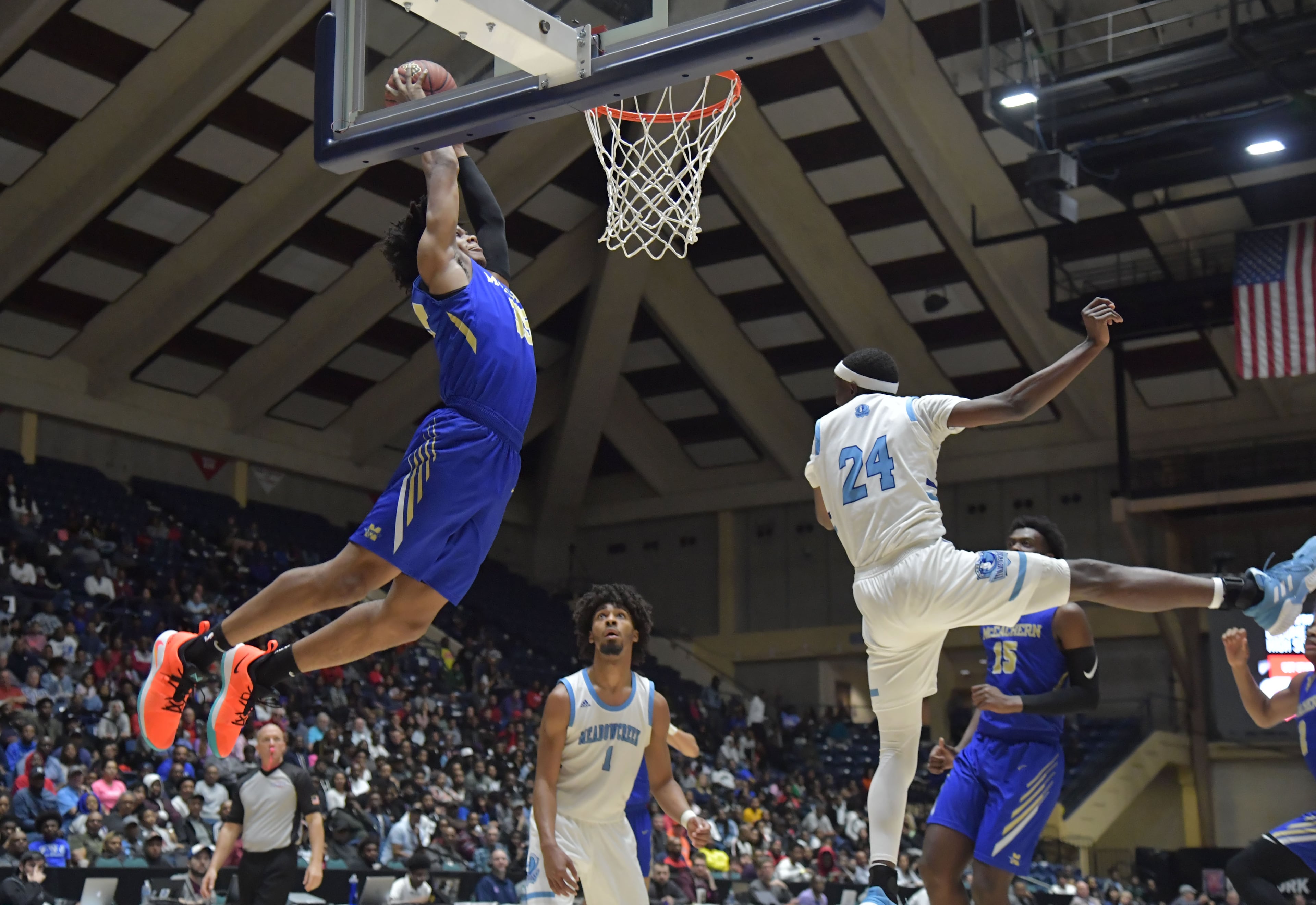 March 9, 2019 Macon - McEachern Isaac Okoro (35) ducks the ball against Meadowcreek in GHSA State Basketball Championship game at the Macon Centreplex in Macon on Saturday, March 9, 2019. McEachern won 62-54 over the Meadowcreek. HYOSUB SHIN / HSHIN@AJC.COM