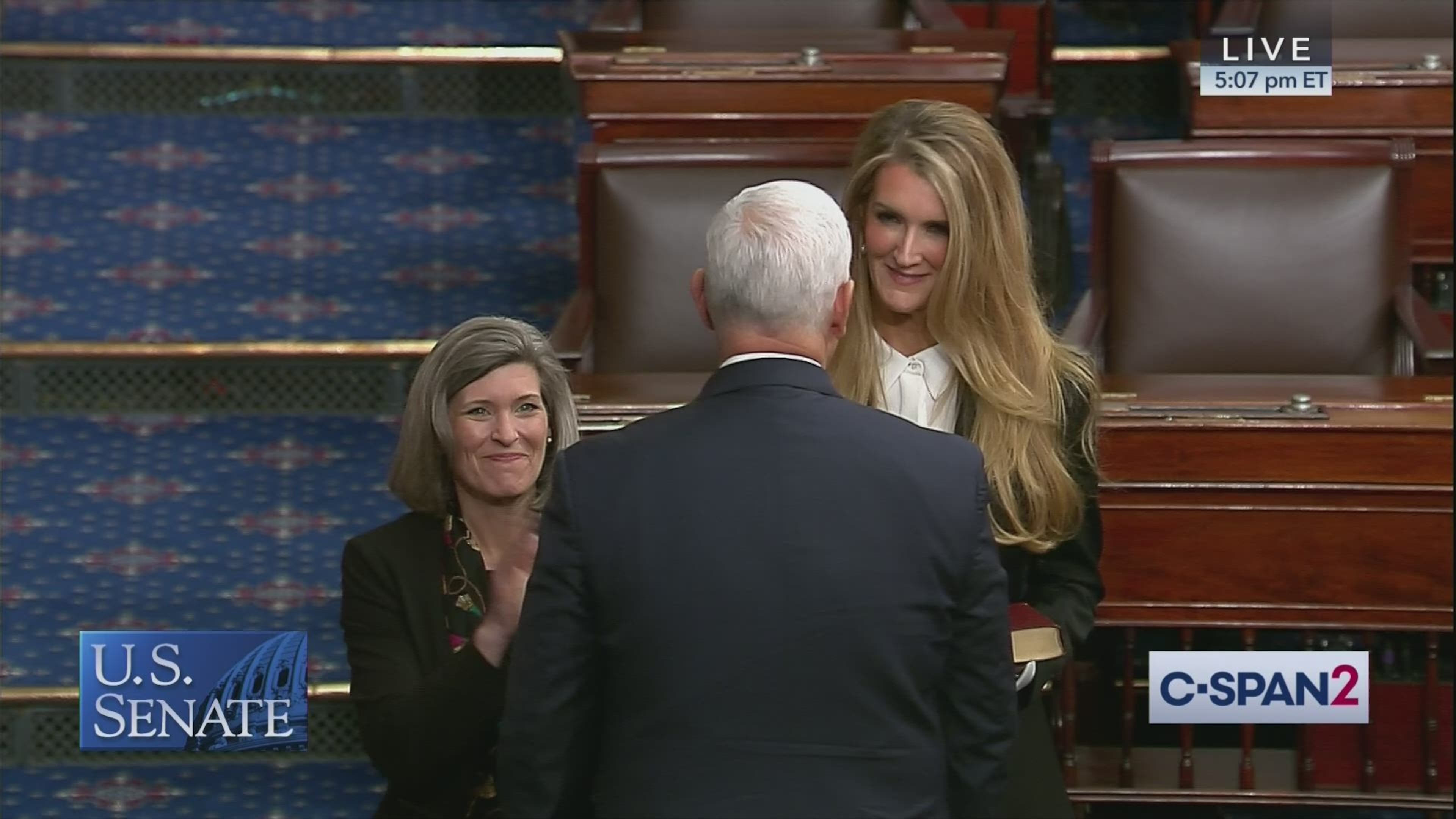 U.S. Sen. Joni Ernst of Iowa observes as U.S. Sen. Kelly Loeffler of Georgia is sworn into office by Vice President Mike Pence. Photo courtesy of C-SPAN.