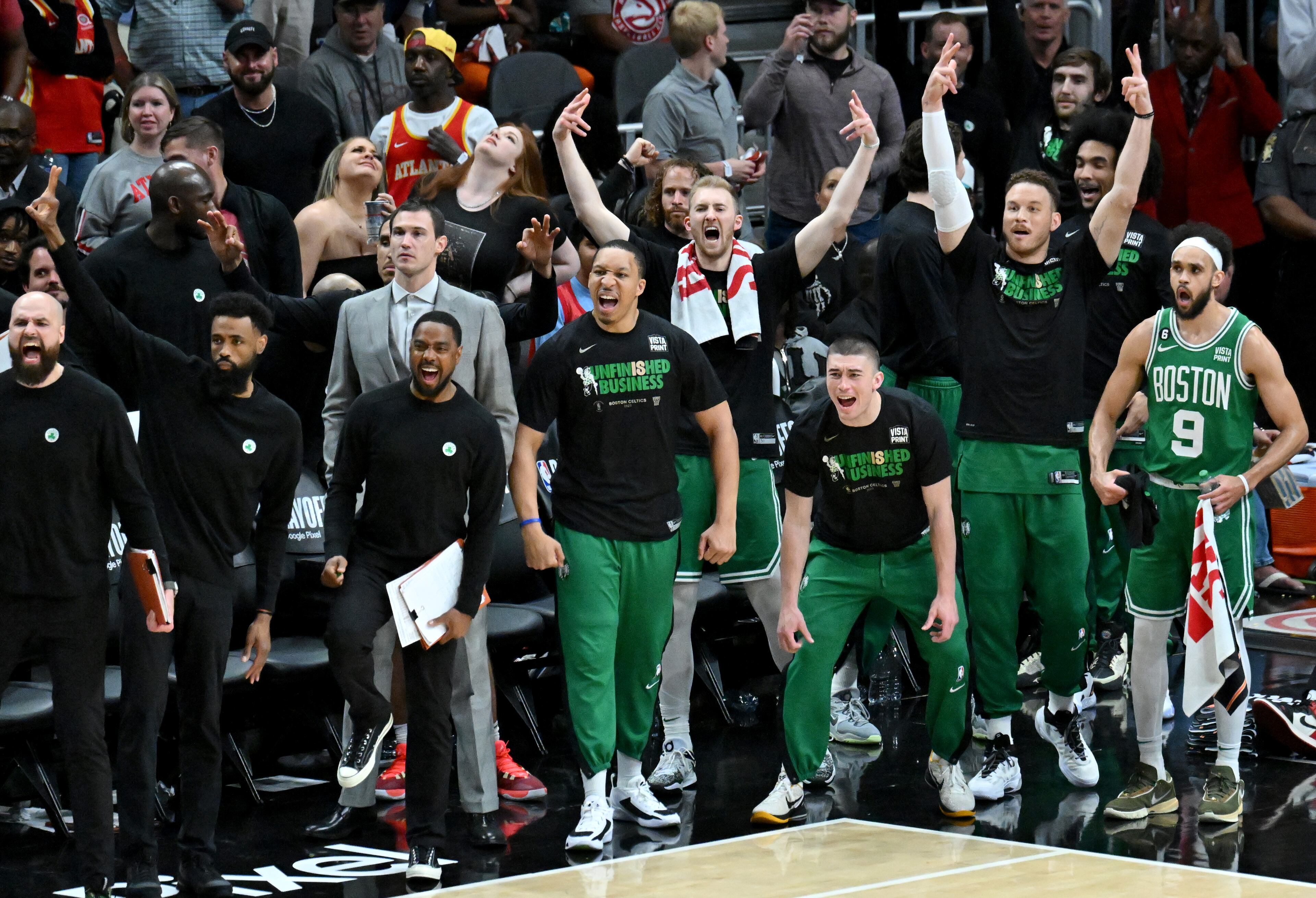 Celtics players celebrate at the end of Game 4 against the Hawks in the first round of the Eastern Conference playoffs at State Farm Arena, Sunday, April 23, 2023, in Atlanta. The Celtics won 129-121. (Hyosub Shin / Hyosub.Shin@ajc.com)