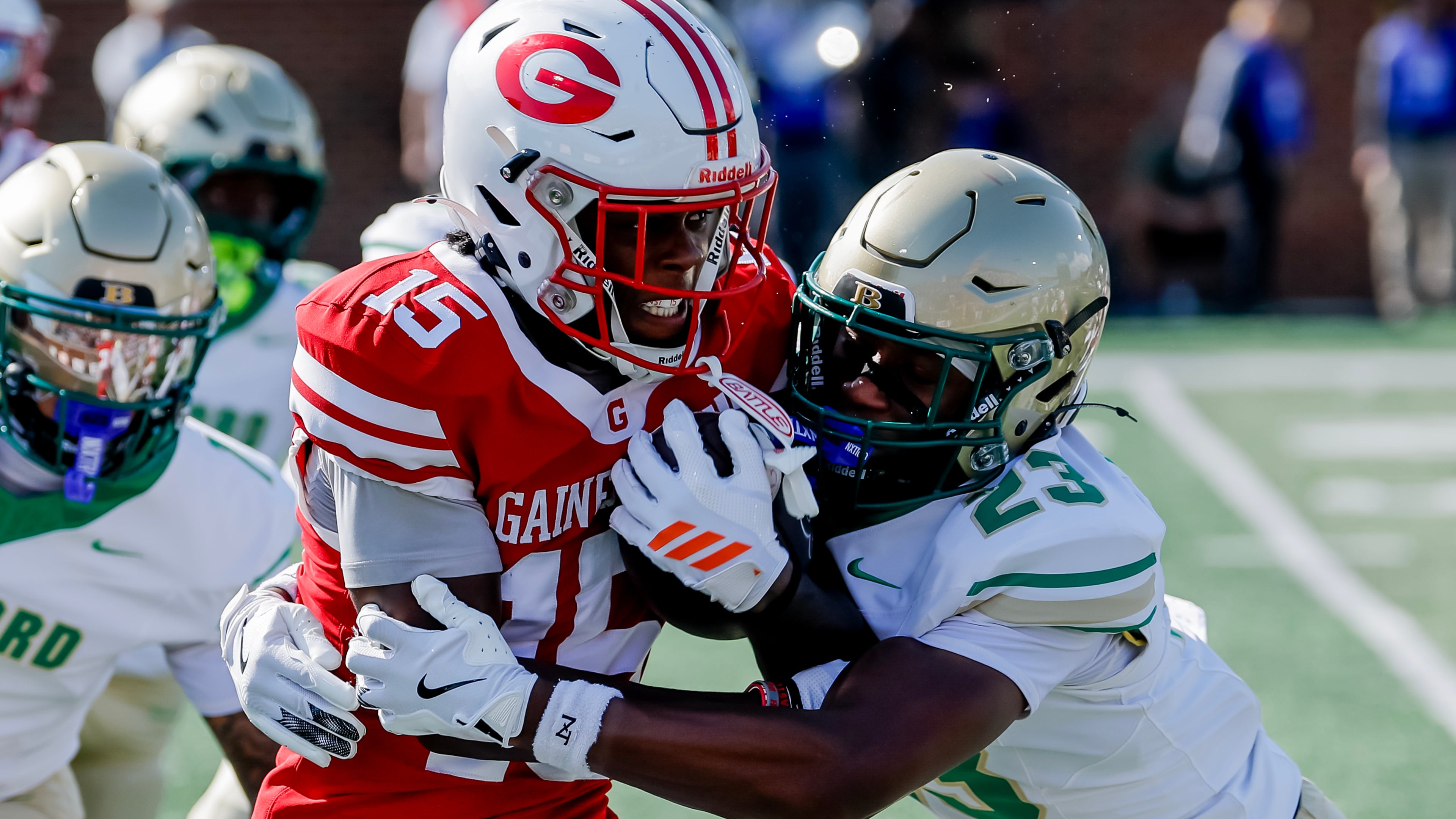 Gainesville’s Legend Wilmont (left) runs against Buford’s DJ Ford during their game on Saturday, Aug. 22, 2026, in Buford. Blue-chip prospects and lesser-knowns from both teams became gamechangers before a national audience. (Erik S. Lesser for the AJC)