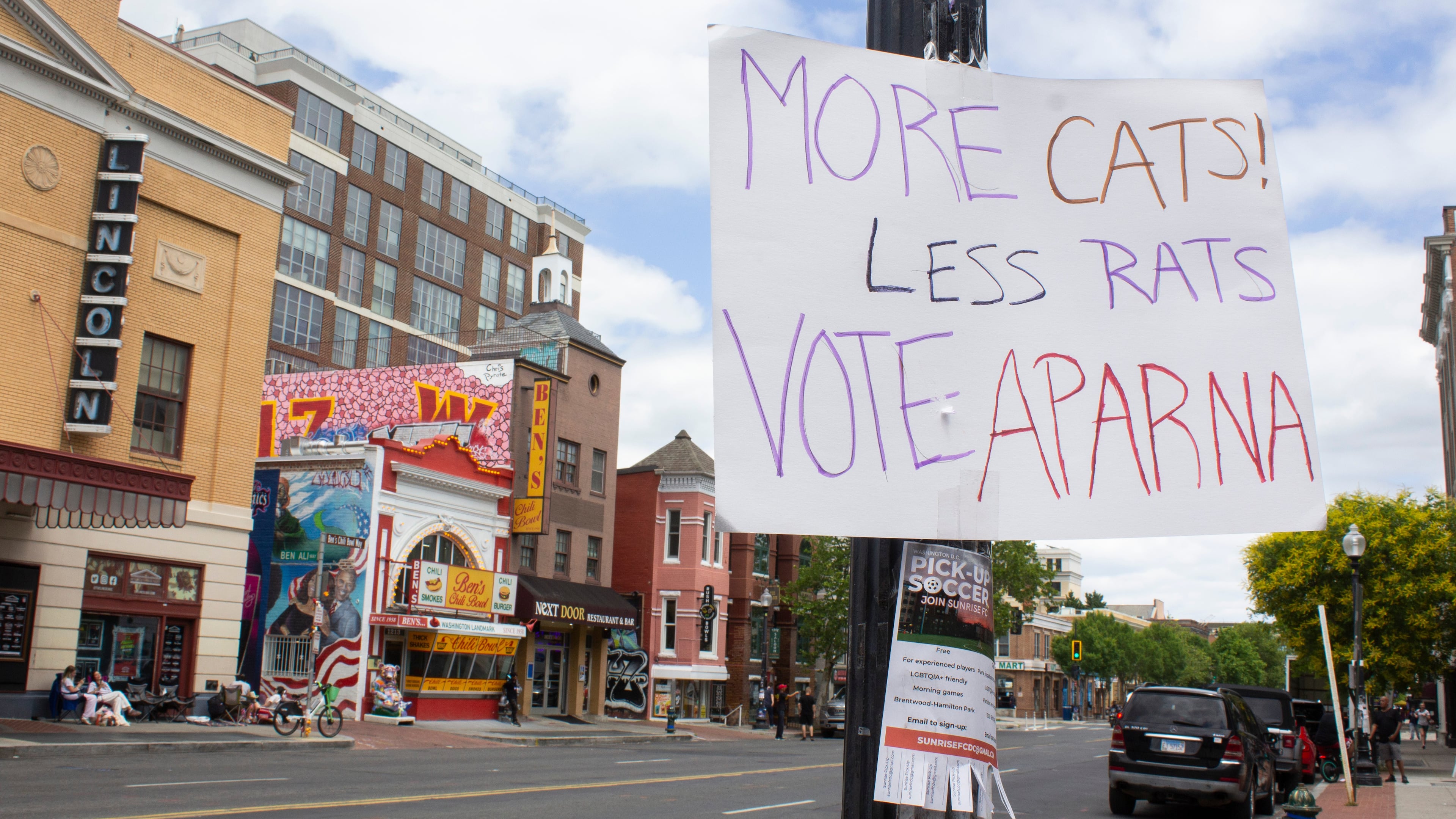 A hand-made campaign sign is posted outside the Lincoln Theatre and Ben’s Chili Bowl in the U Street Corridor of Washington, Sunday, June 7, 2026. (AP Photo/Tallulah Brown Van Zee)