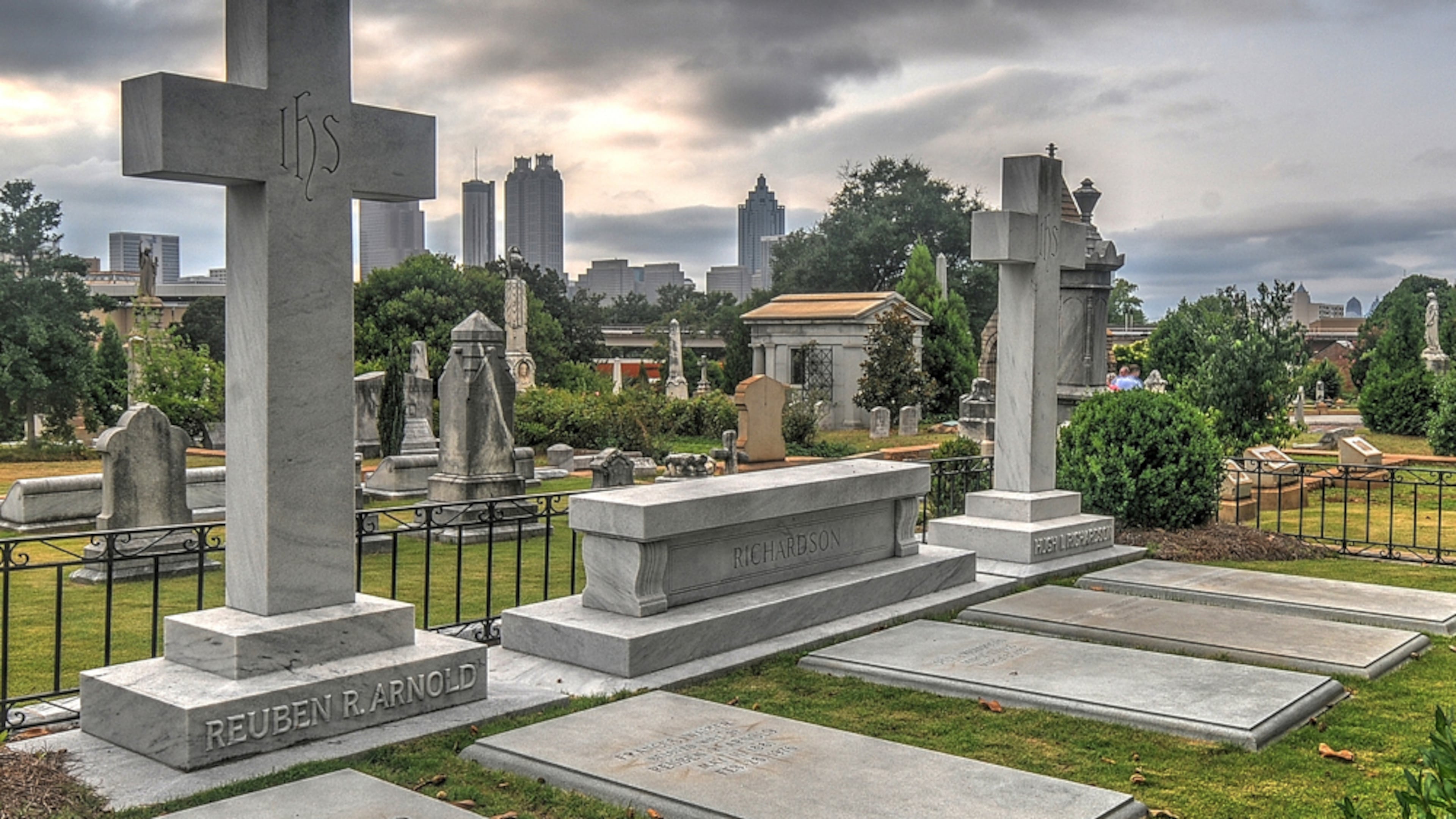 Late evening sun sets on Oakland Cemetery after a historic tour of the cemetery lead by volunteers on July 19, 2014. The 48 acre cemetery sits near downtown Atlanta and is bordered by Memorial Drive, Oakland Avenue, Boulevard and the rail line running along Decatur Street. The cemetery (originally six acres) has grown since its opening and host the remains of many of Atlanta's leaders and political figures. (CHRIS HUNT/SPECIAL)