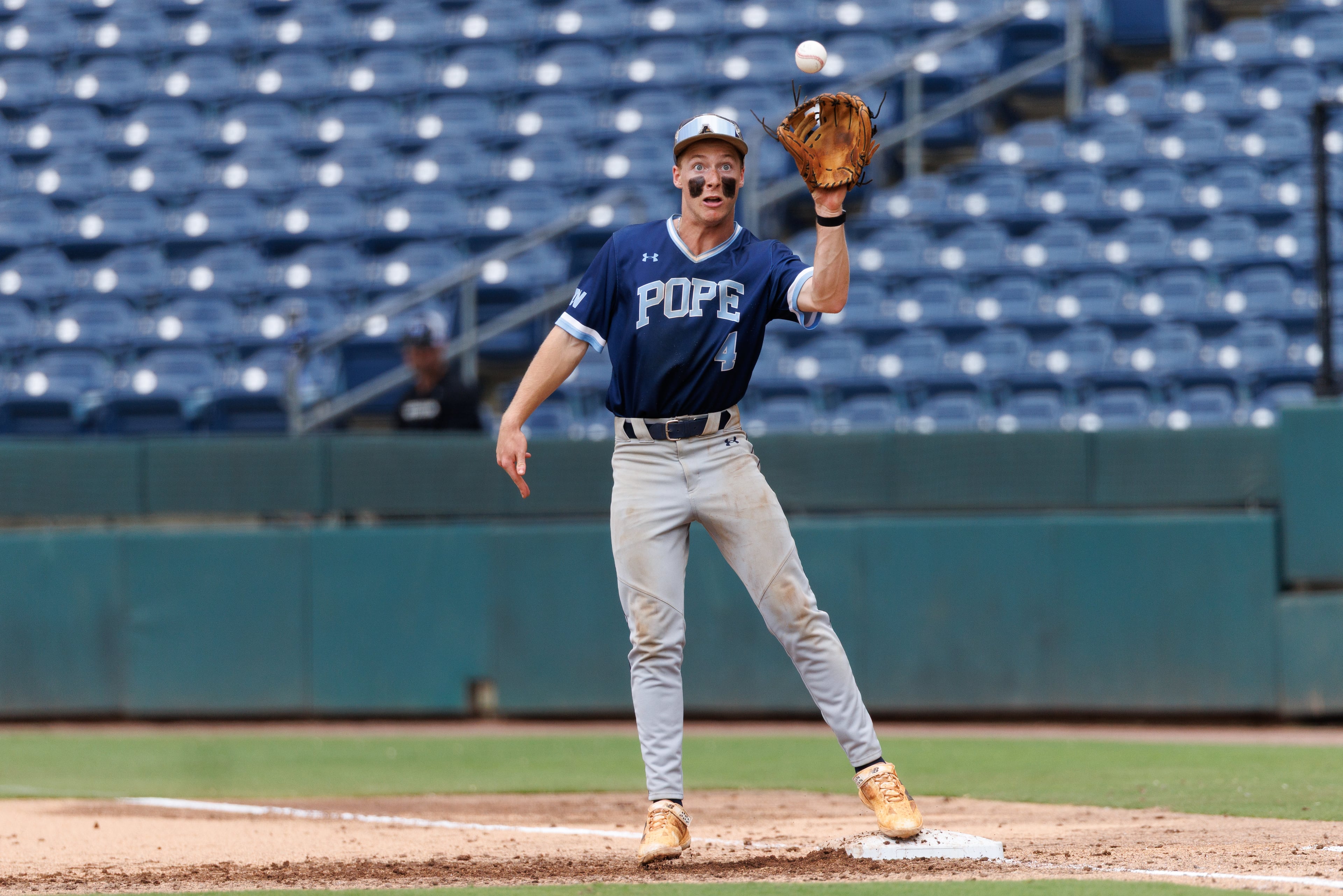 Pope's Kingston Jones catches the ball during the fifth inning of Game 1 of the GHSA Class 5A baseball state championship series Monday, May 25, 2026, at Gwinnett Field in Lawrenceville. (Estela Muñoz/AJC)