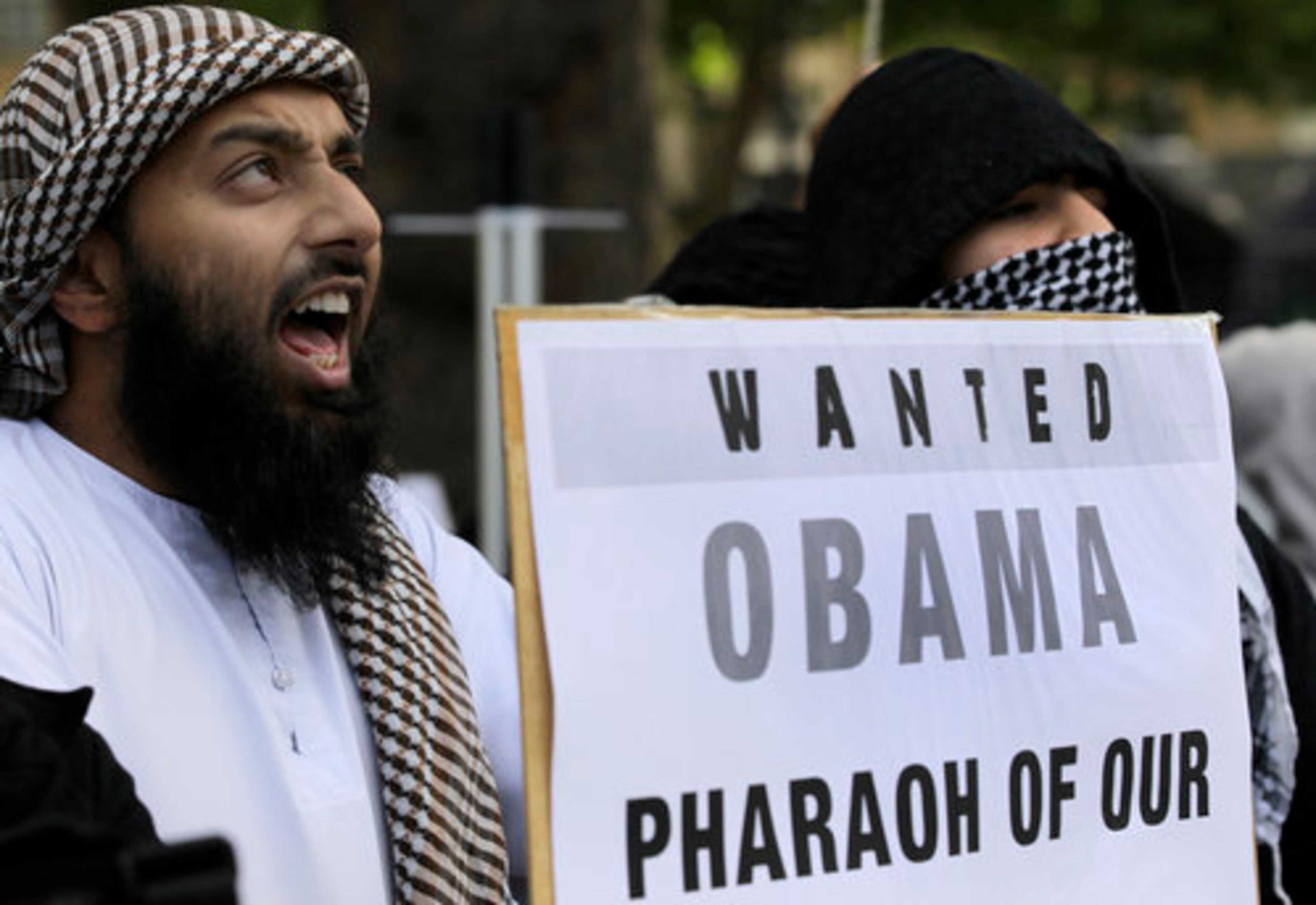 Islamic protesters stand outside Downing Street in London as President, Barack Obama visits the city on Tuesday, May 24, 2011. Obama is on a state visit to the United Kingdom.