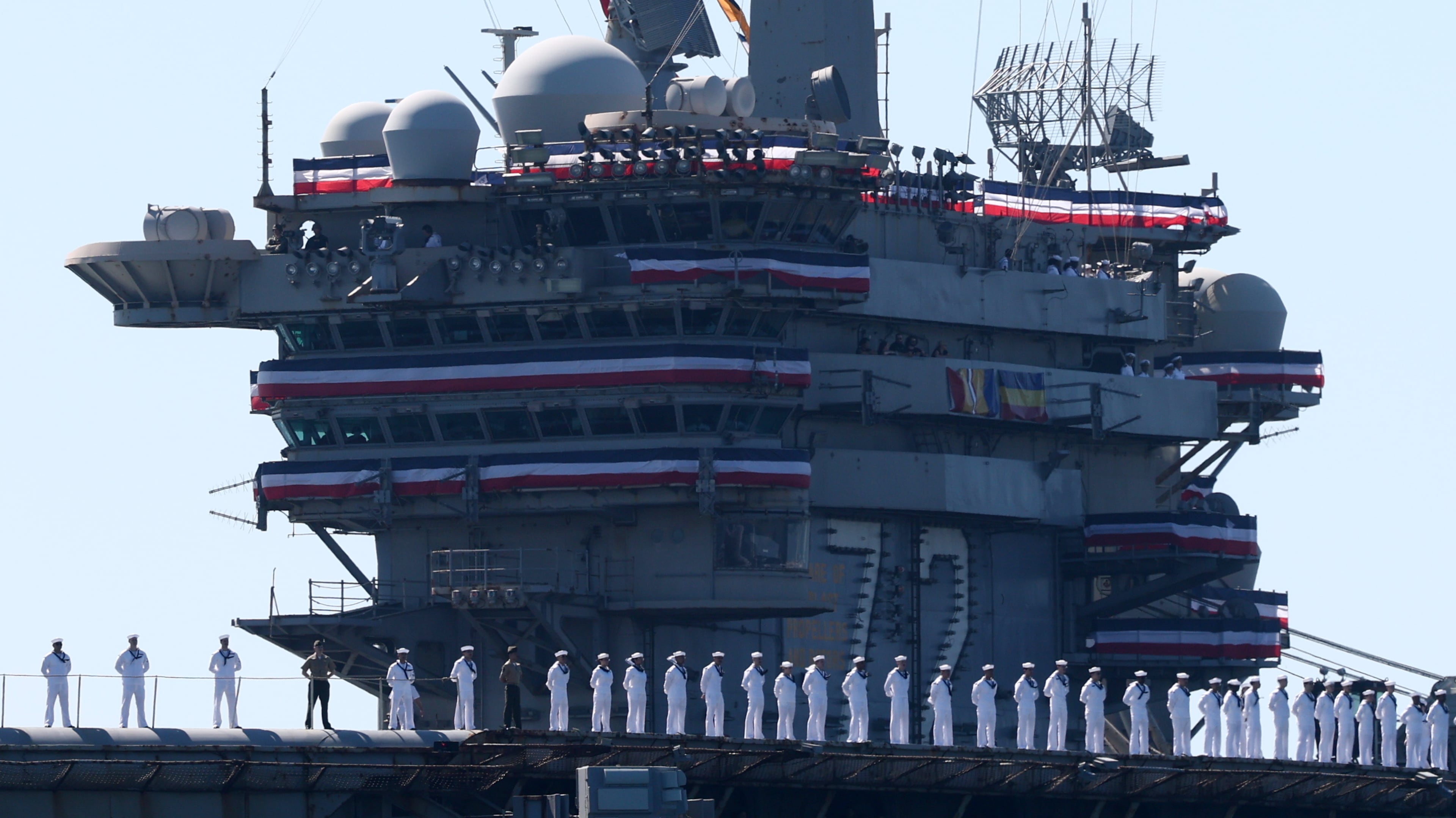 The USS Abraham Lincoln aircraft carrier returns to the San Diego Bay after deployment Thursday, Oct. 8, 2026, in San Diego. (AP Photo/Karl Anderson)