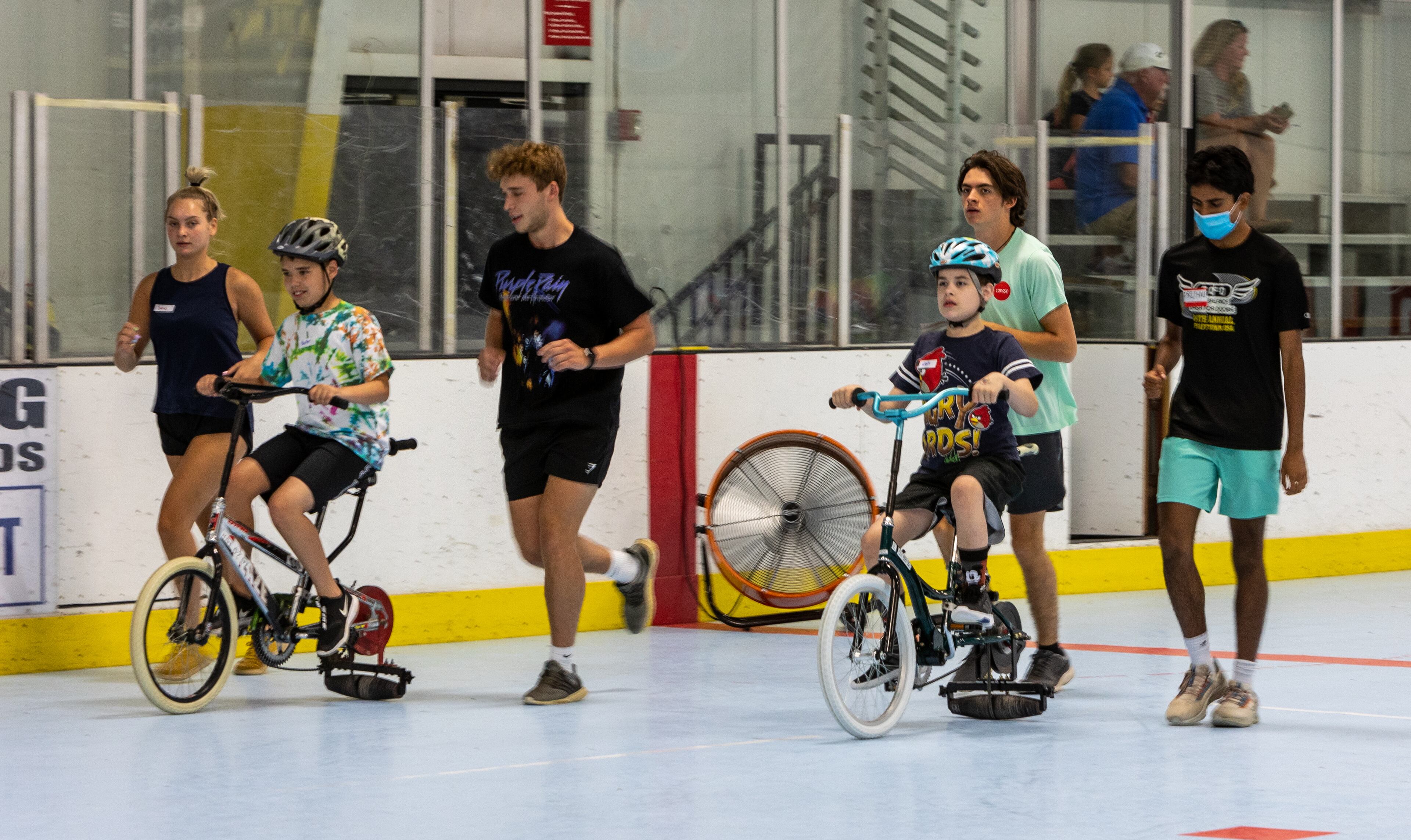 Special needs people learned how to ride a two-wheel bike with adaptations during the iCan Bike Alpharetta camp at The Cooler in Alpharetta. PHIL SKINNER FOR THE ATLANTA JOURNAL-CONSTITUTION.