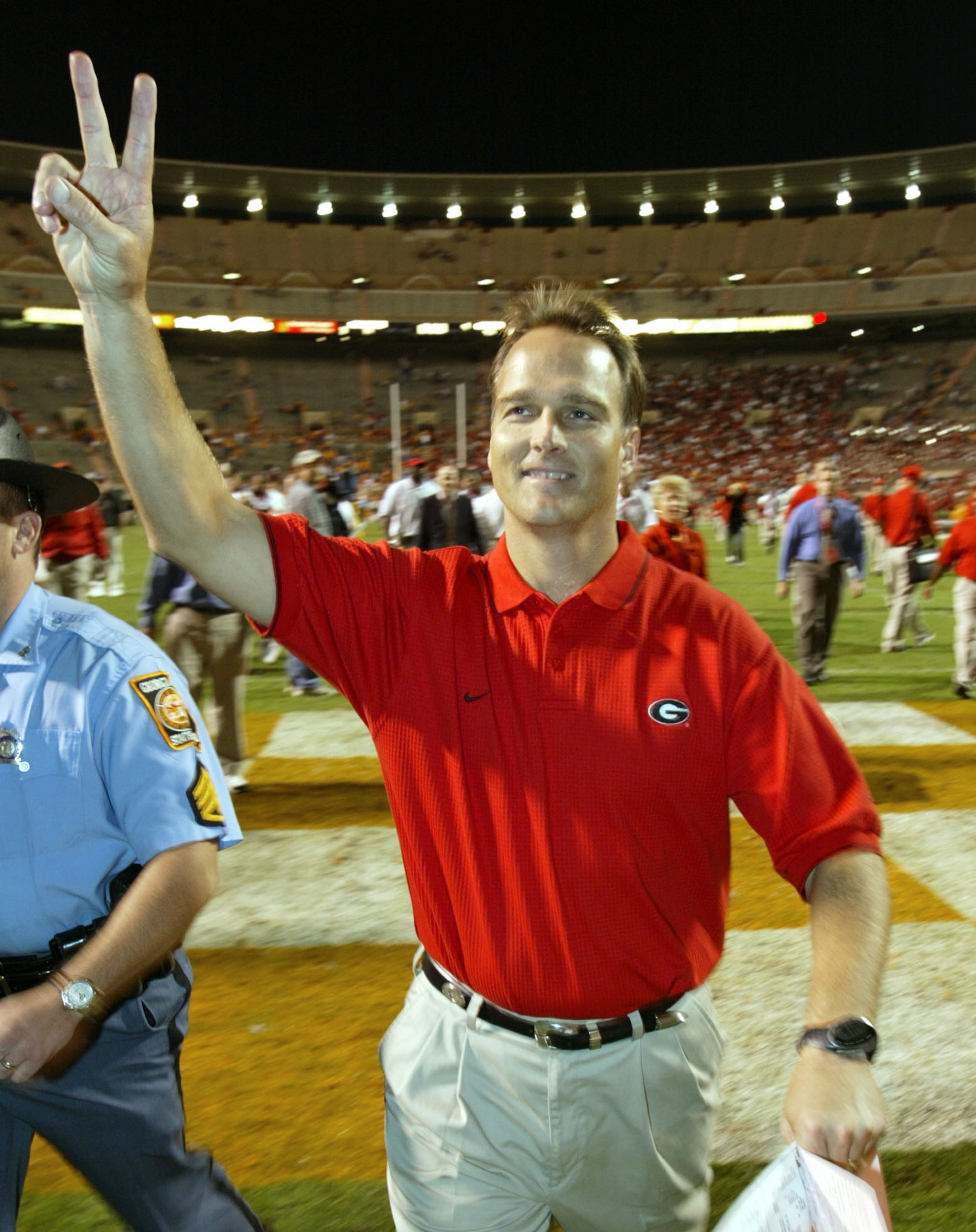 Richt acknowledges fans after UGA's 41-14 victory at Tennessee in 2003.