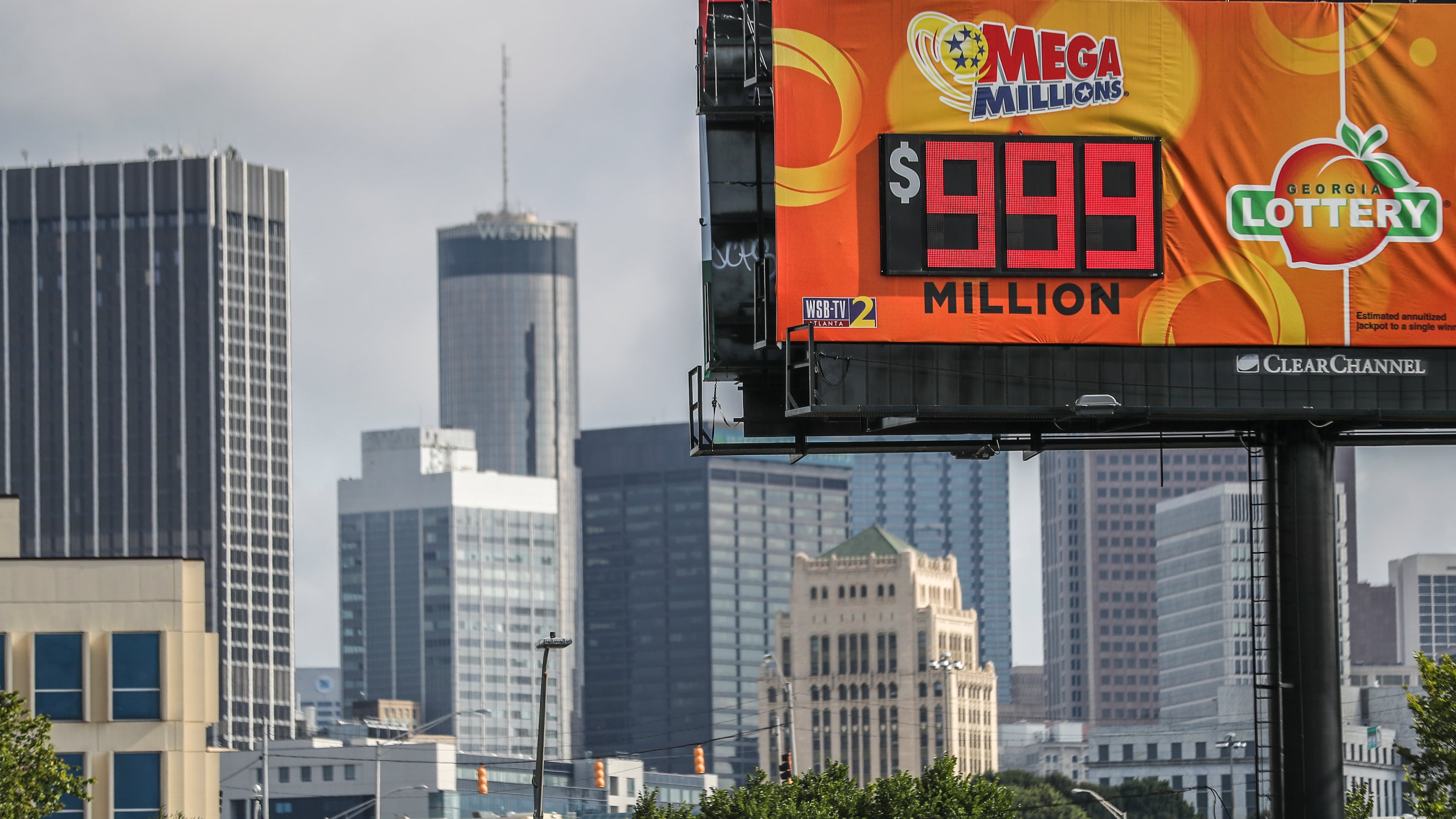 Bigger jackpots are expected more often with the changes to the Mega Millions lottery game, such as when it topped $1 billion in 2023 but the Atlanta signage could only go up to $999 million. Tuesday's jackpot is "only" $54 million. (John Spink / AJC)