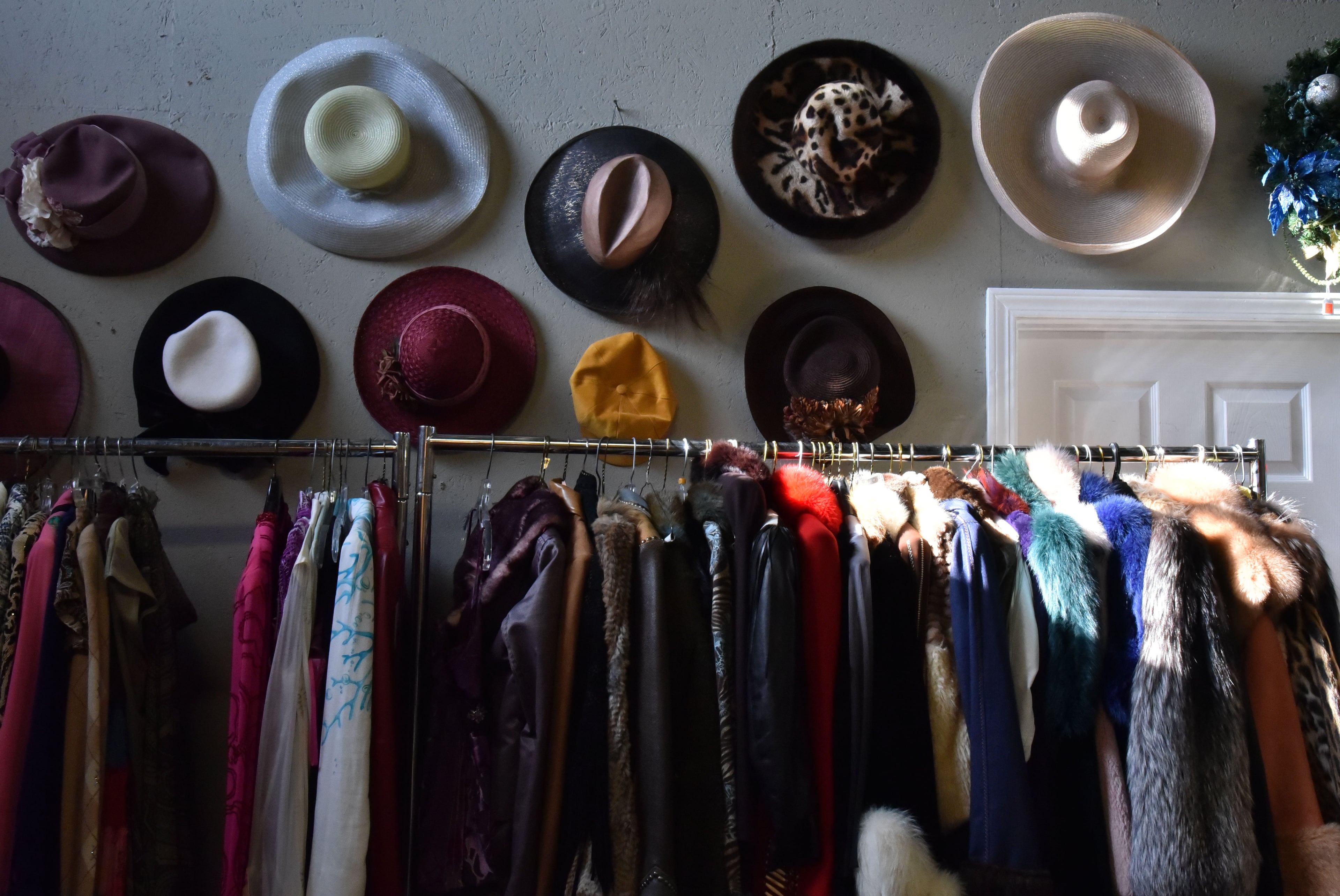 More than 2,000 items of Diane McIver's clothing and jewelry are seen on December 2, 2016, in a warehouse showroom of Peachtree Battle Estate Sales and Liquidations. Tex McIver has enlisted an estate liquidation company to sell his deceased wife's clothing and jewelry items. HYOSUB SHIN / HSHIN@AJC.COM