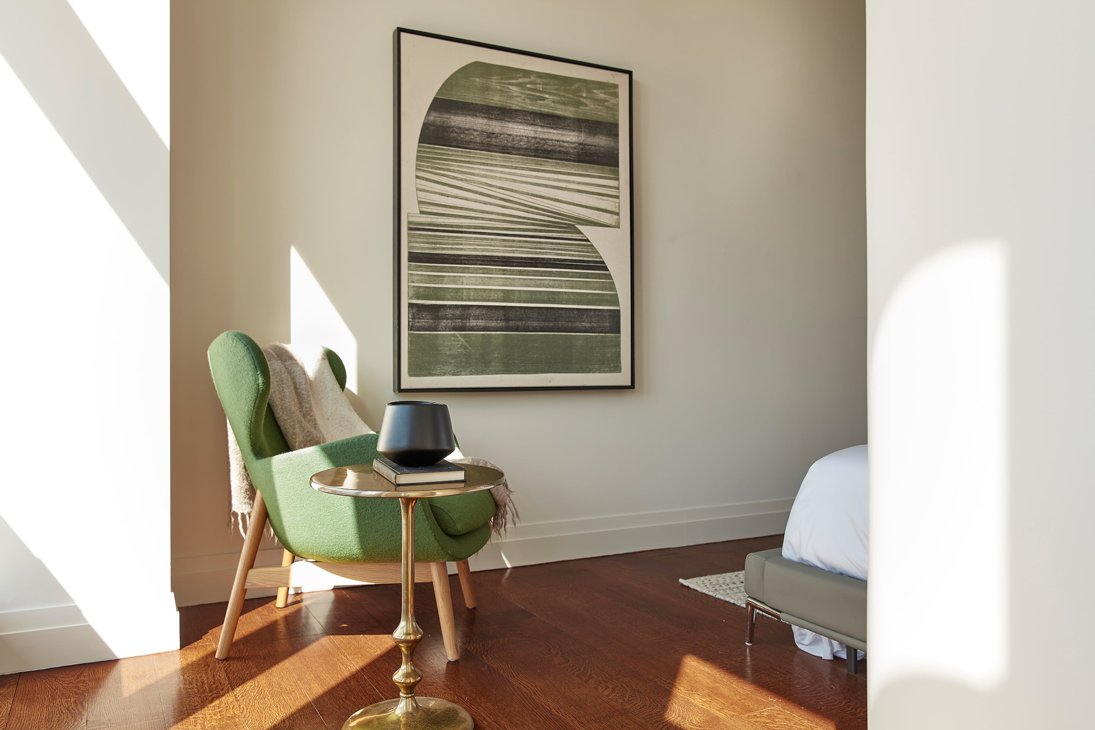 A grass green chair is paired with black accents for a modern, fresh, fall look. (Scott Gabriel Morris/Handout/TNS)