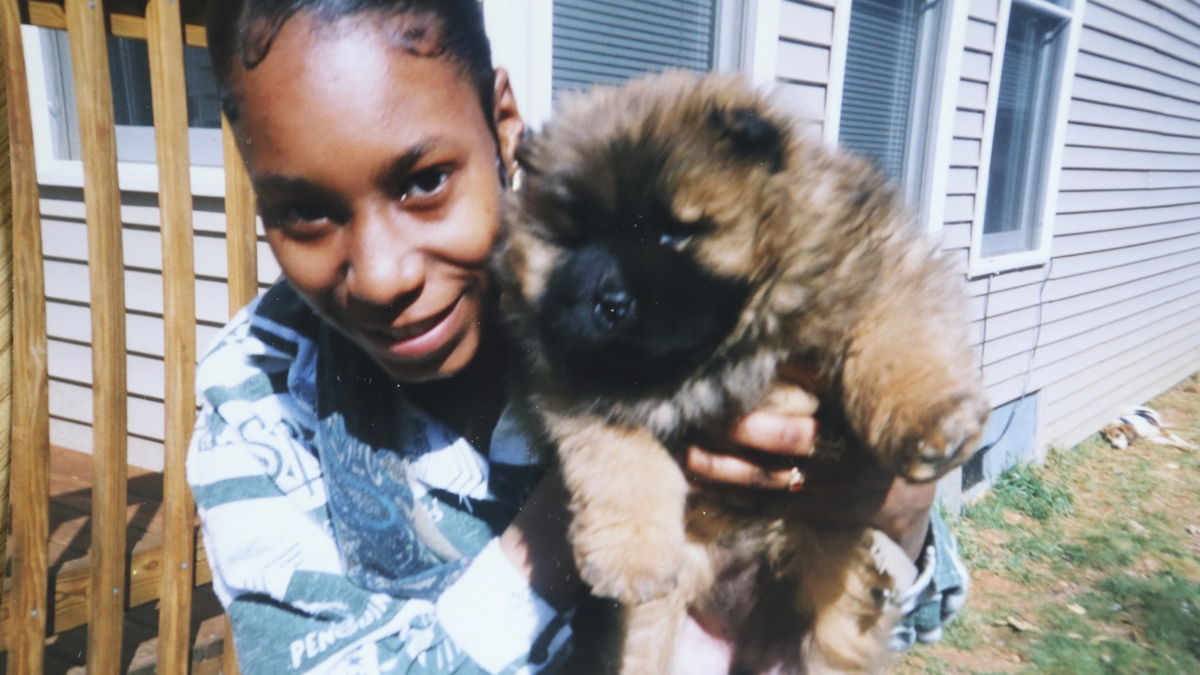 Kisha S. Holmes, a Marine veteran, grew up in Brooklyn, New York. She is pictured here in a family photo from her childhood. She was raised by aunts after going through the state foster care system. (Family Photos)