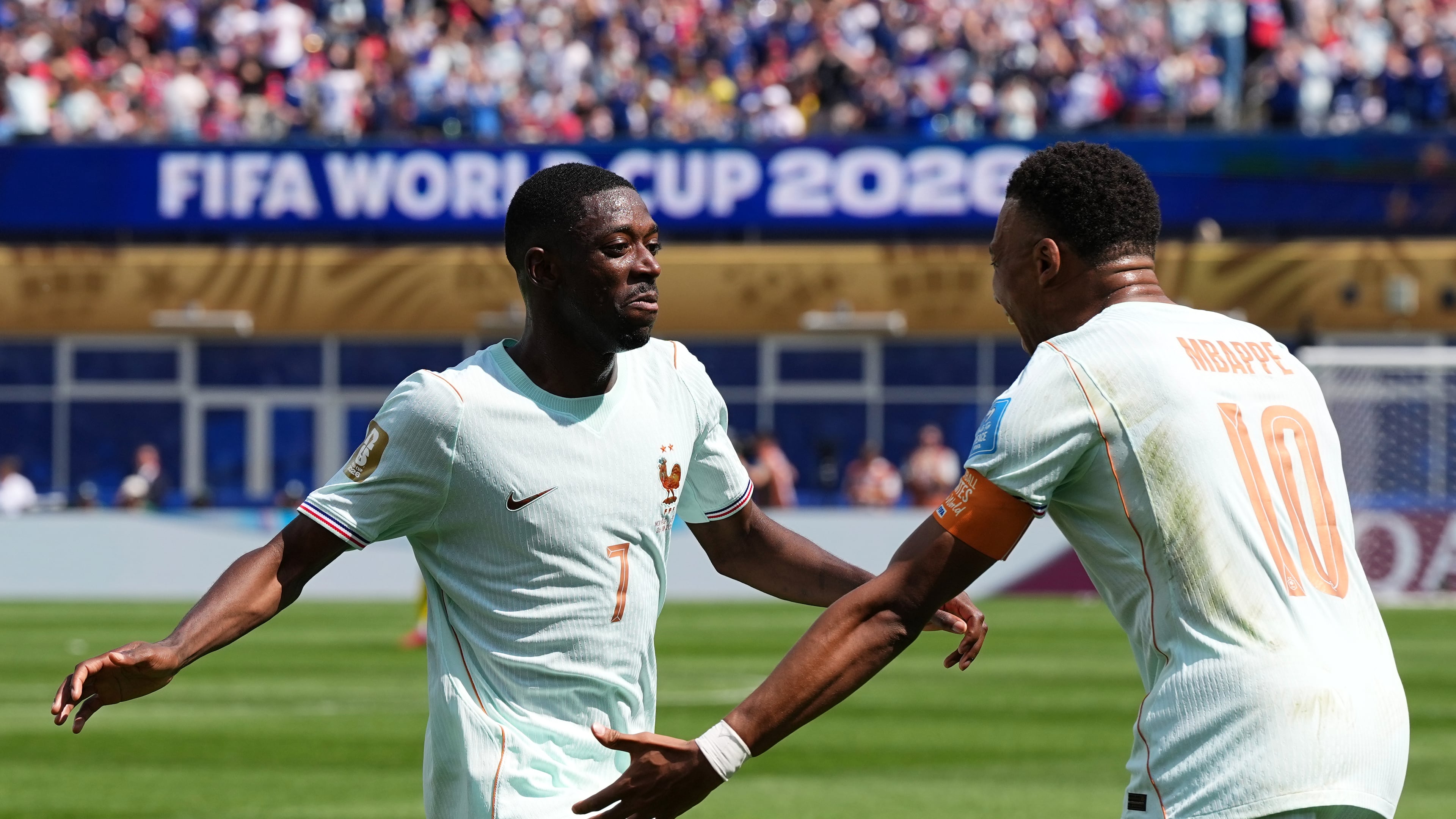 France's Ousmane Dembele celebrates with Kylian Mbappe, right, after scoring his side's third goal during the World Cup Group I soccer match between Norway and France in Foxborough, Mass., near Boston, Friday, June 26, 2026. (AP Photo/Martin Meissner)