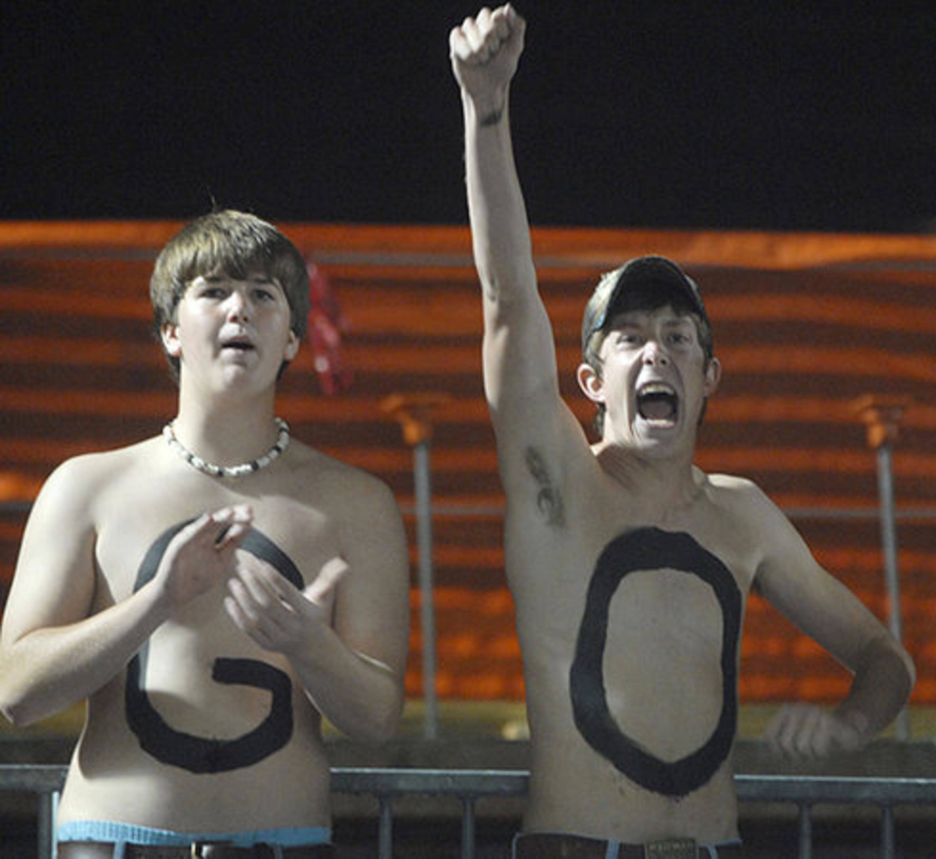 Washington County fans Tyler Reynolds and Andrew Yates show some love for their team.