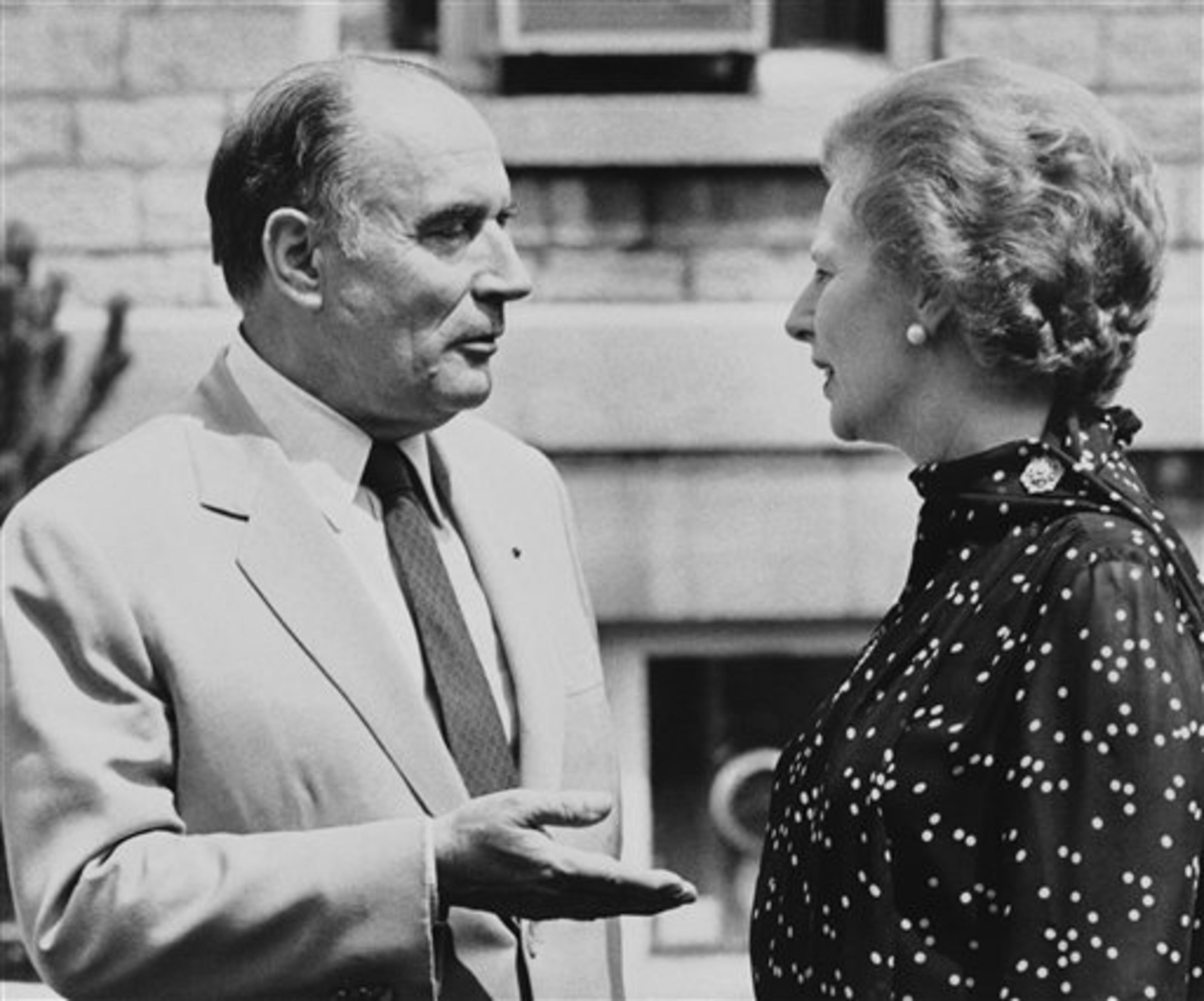 French President Francois Mitterrand and the British Prime Minister Margaret Thatcher, chat together after the morning session of the Ottawa Summit held in Ottawa on Tuesday, July 21, 1981. (AP Photo)