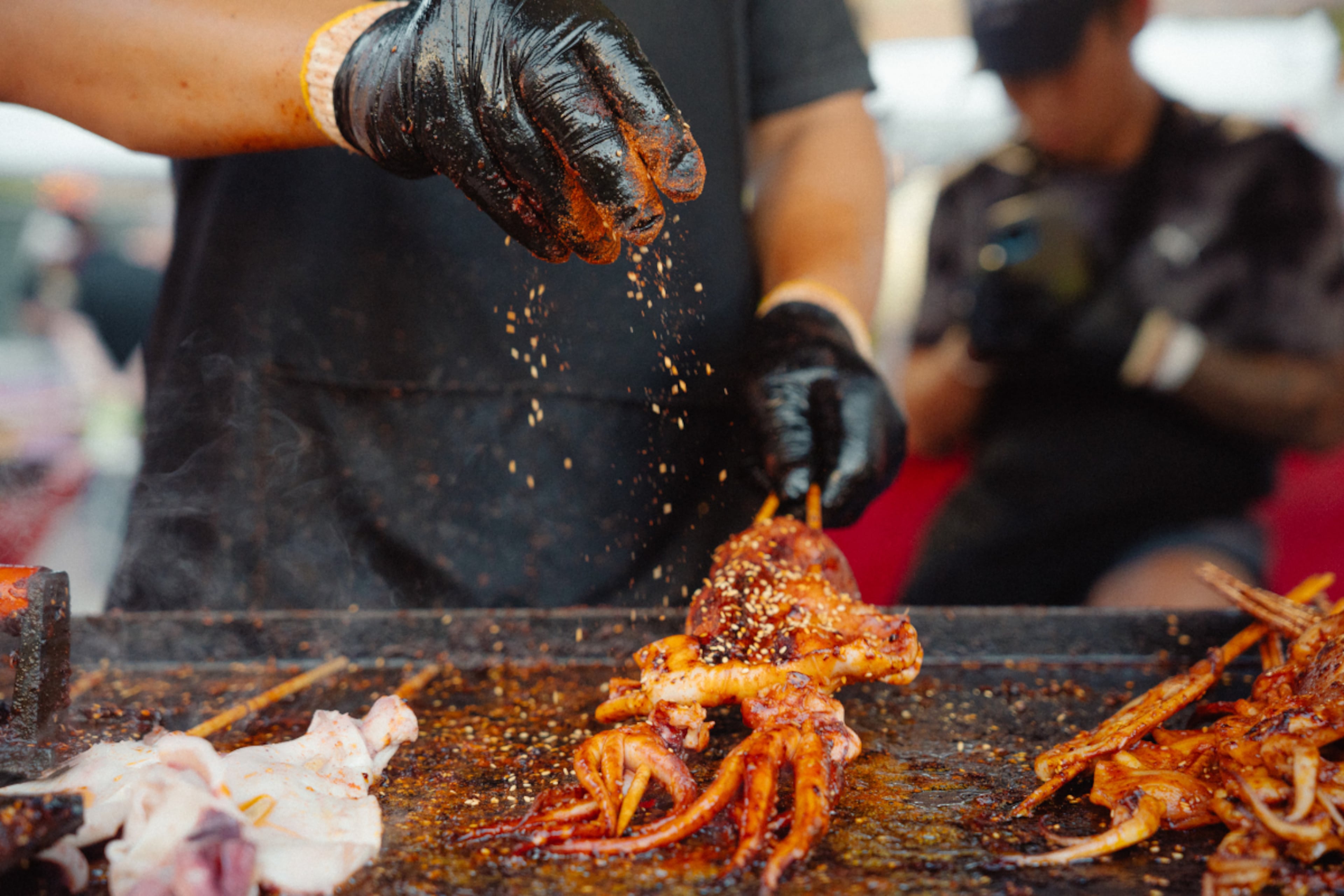 More than 80 Asian food vendors will participate in Panda Fest on Friday, April 3, through Sunday, April 5, at Atlantic Station's Pinnacle Lot. Pictured is squid being grilled by King Squid. (Courtesy of Panda Fest)