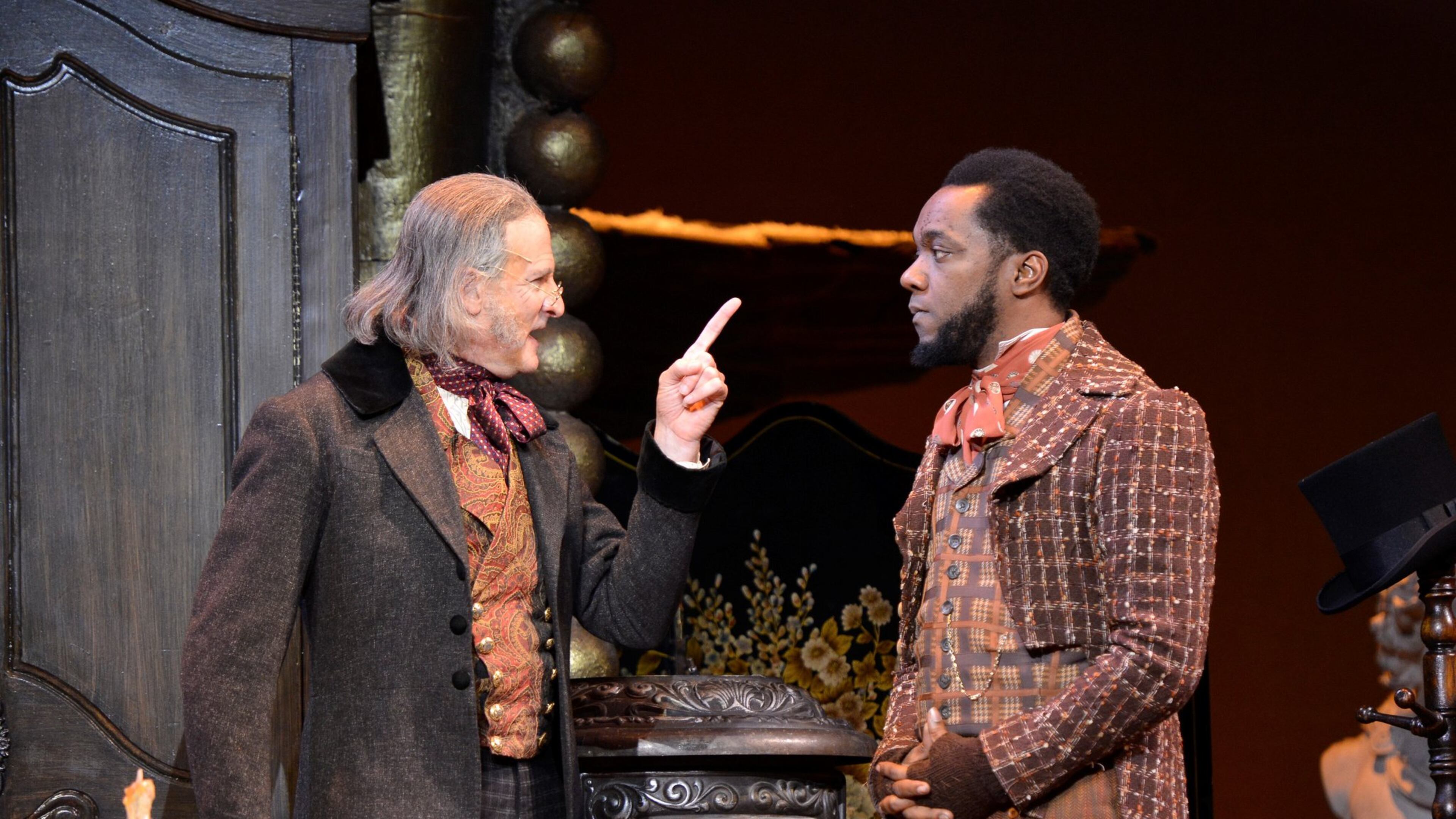 David de Vries as Scrooge and Neal Ghant as Bob Cratchit in “A Christmas Carol” at the Alliance Theatre. CONTRIBUTED BY GREG MOONEY