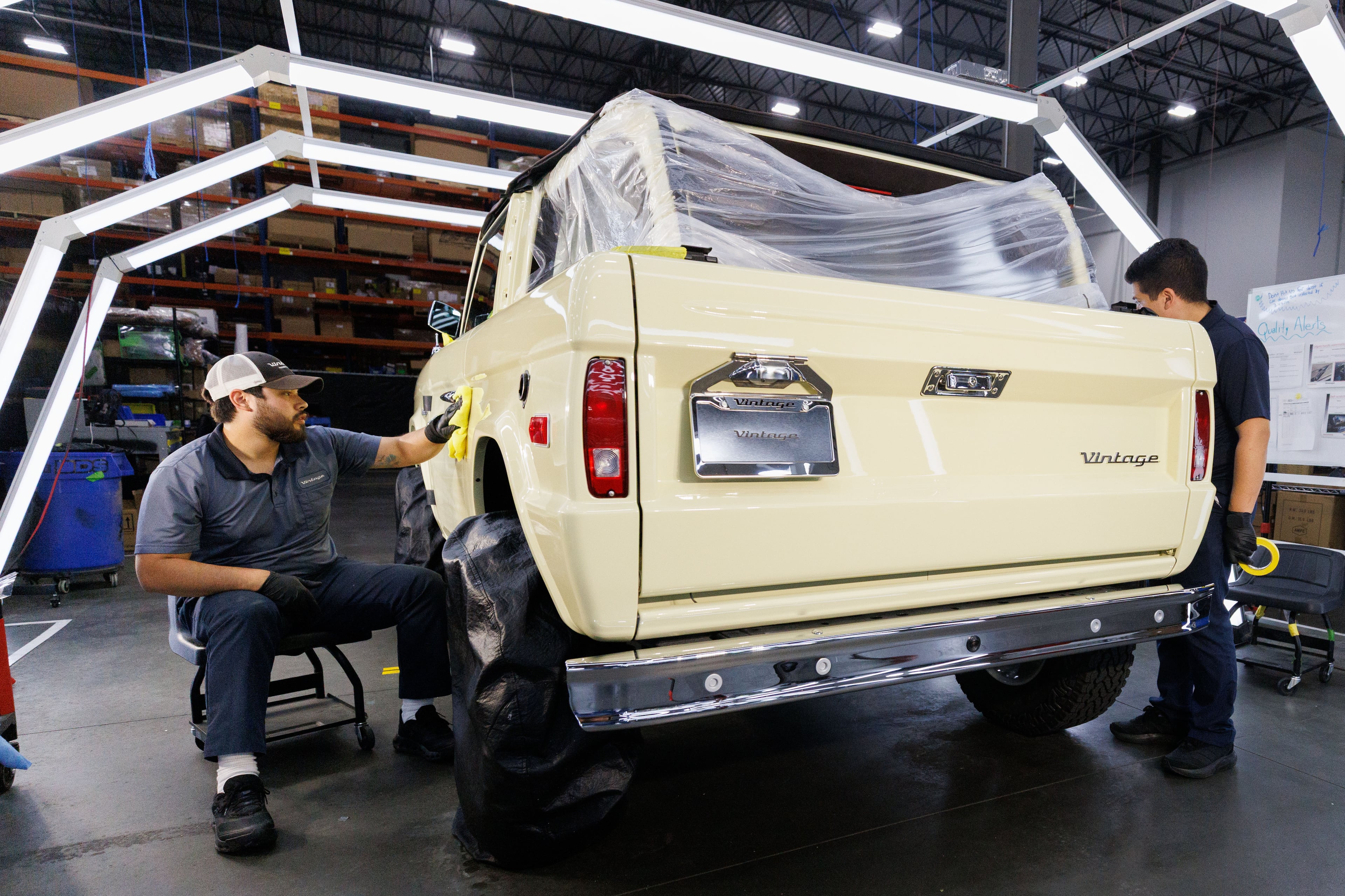 At the Vintage Modern headquarters and auto shop in Buford, Ga., employees work to place classic and vintage car bodies atop modern vehicle platforms on Friday, June 26, 2026. (Estela Muñoz/AJC)