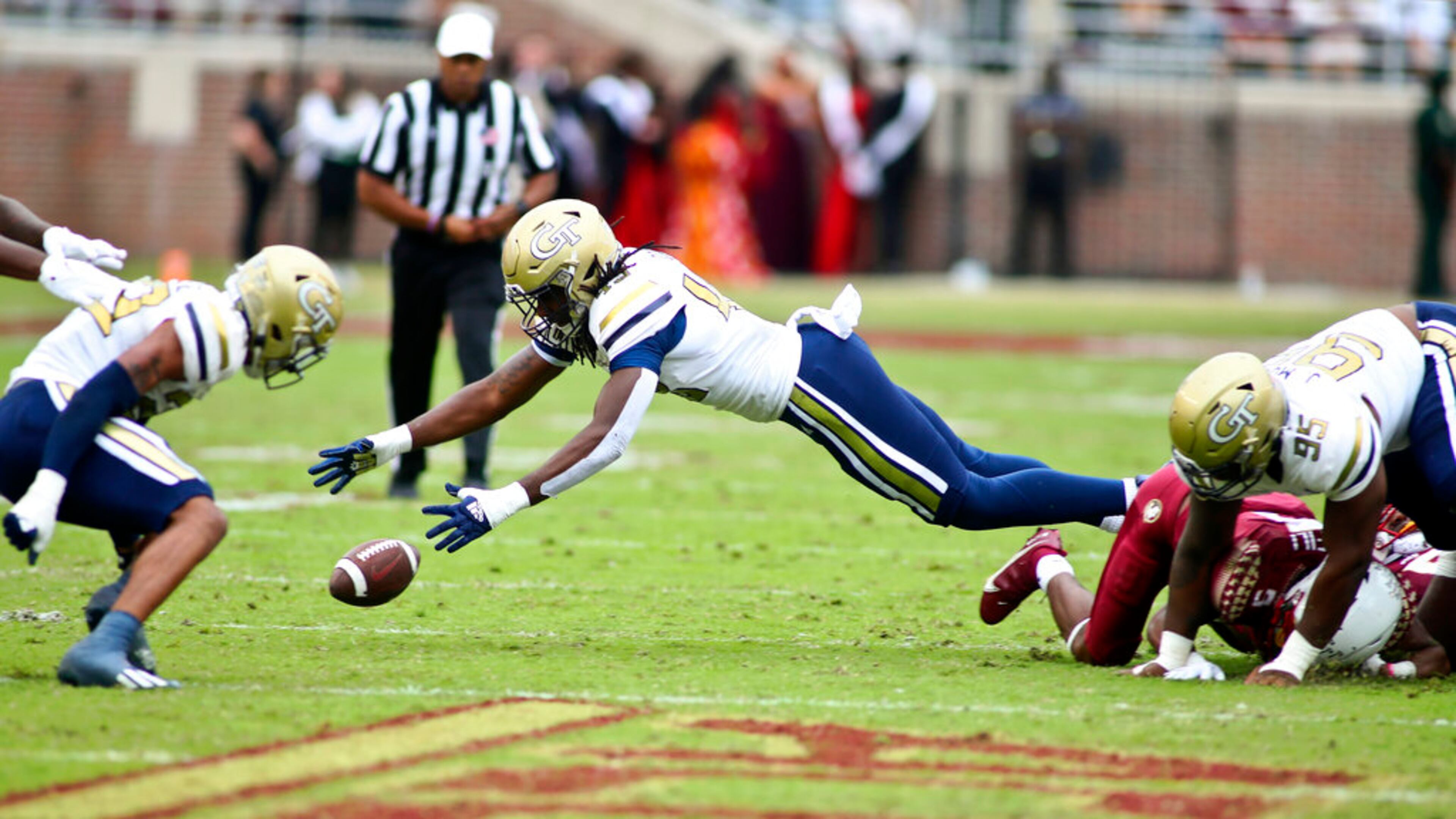 Georgia Tech defensive lineman Noah Collins (43) dives to recover a fumble by Florida State running back Lawrance Toafili (not pictured) in the first half of an NCAA college football game Saturday, Oct. 29, 2022, in Tallahassee, Fla. (AP Photo/Phil Sears)