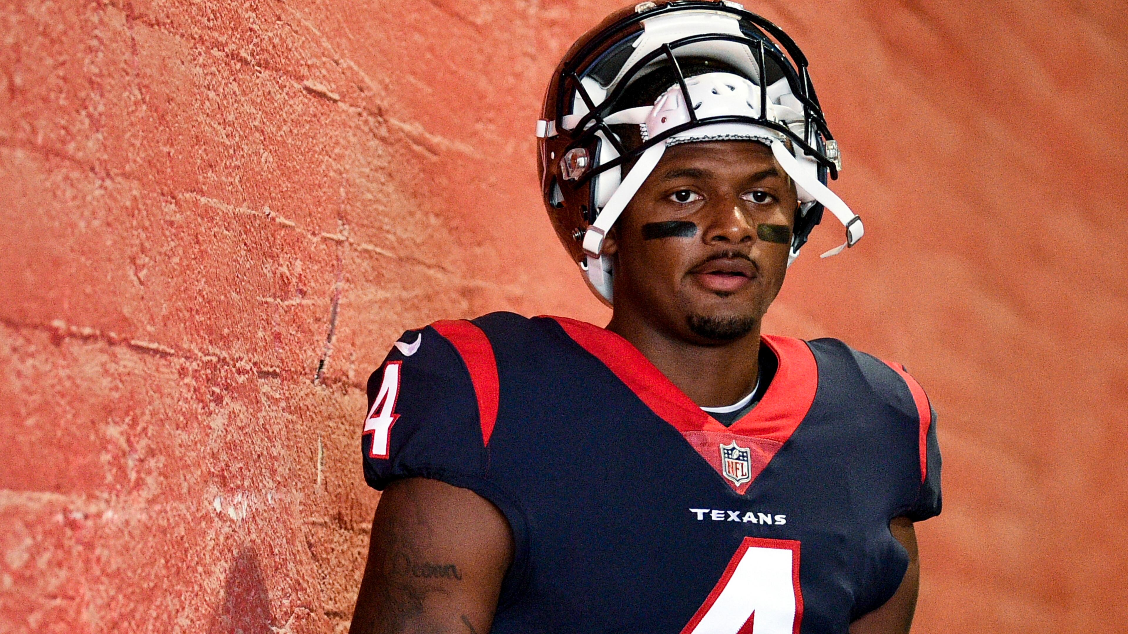 Houston Texans quarterback Deshaun Watson prepares to take the field prior to a preseason football game against the Los Angeles Rams Aug. 25, 2018, in Los Angeles. Watson has been sued by more than a dozen women who accuse him of sexual assault and harassments. The NFL says it is investigating earlier allegations by three massage therapists who said the quarterback sexually assaulted them during massages. (Kelvin Kuo/AP)