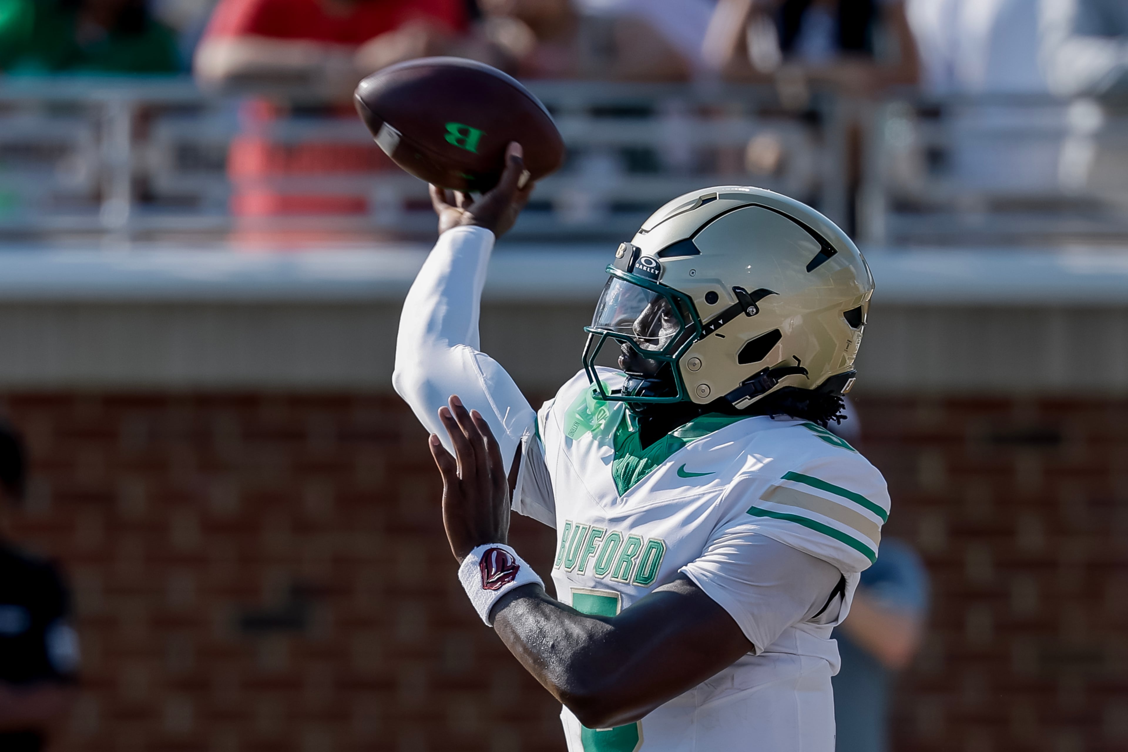 Buford quarterback DJ Hunter throws against Gainesville during the first half on Saturday, Aug. 22, 2026, in Buford. (Erik S. Lesser for the AJC)