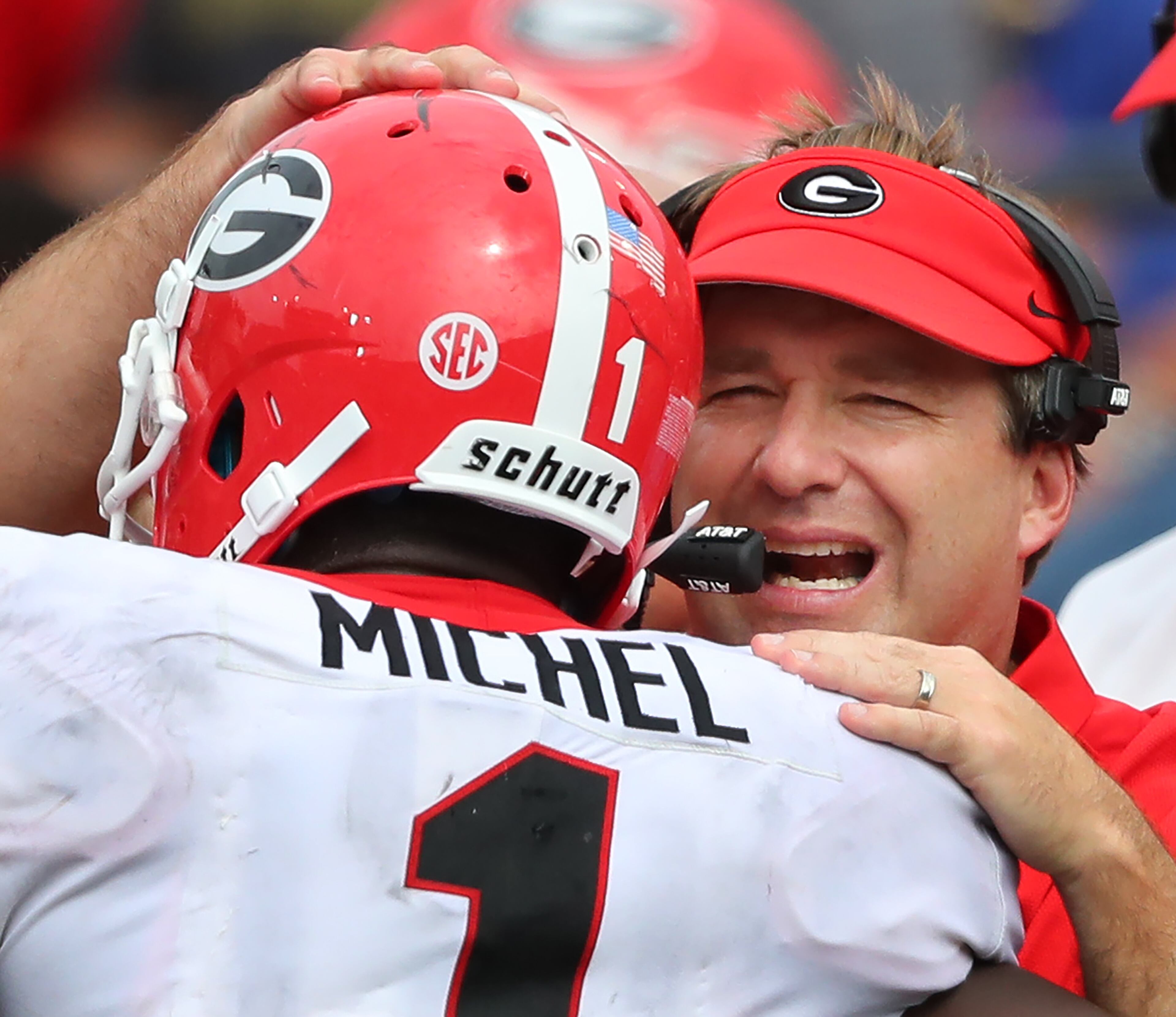 October 7, 2017 Nashville: Georgia head coach Kirby Smart gives tailback Sony Michel a pat on the helmet after his long touchdown run against Vanderbilt to take a 35-7 lead during the third quarter in a NCAA college football game on Saturday, October 7, 2017, in Nashville. Georgia beat Vanderbilt 45-14. Curtis Compton/ccompton@ajc.com
