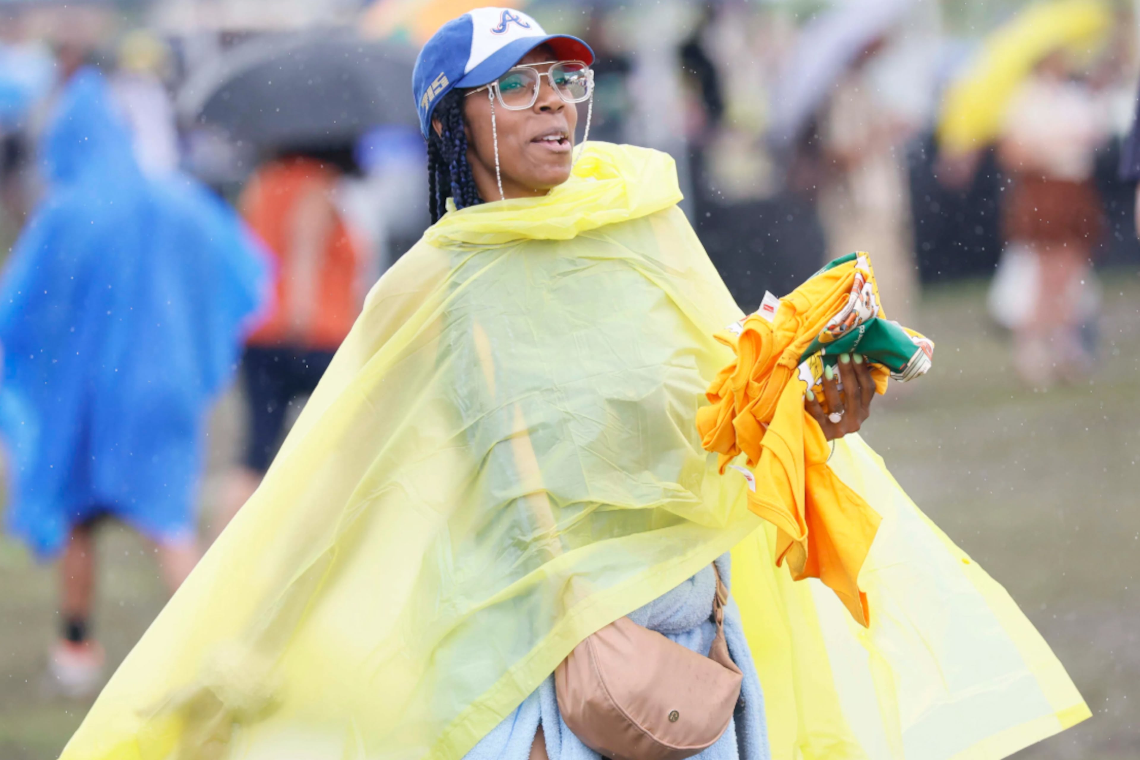 Fans heading downtown for the World Cup game or other festivities Thursday should bring an umbrella or rain poncho as heavy downpours are expected. (Miguel Martinez/AJC)