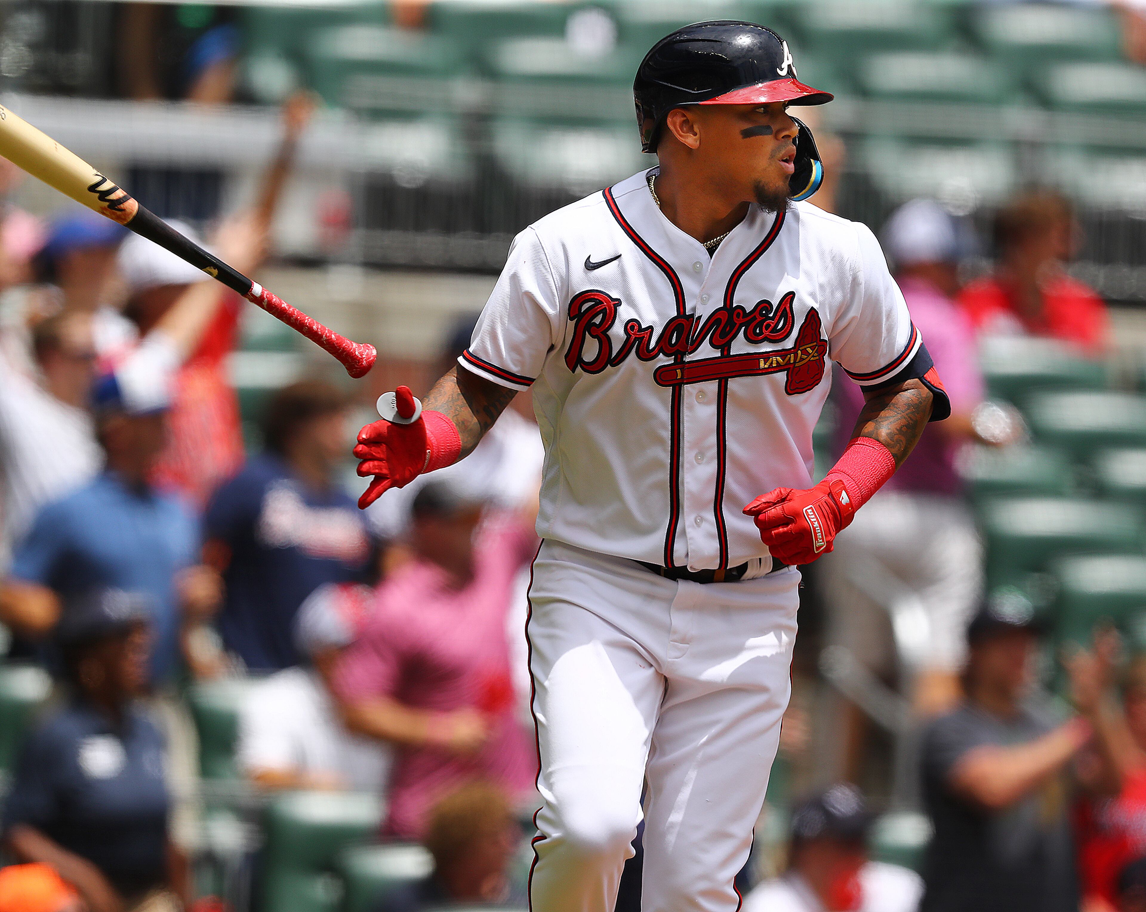 Braves second baseman Orlando Arcia hits a solo homer during the fifth inning Wednesday at Truist Park. (Curtis Compton / Curtis Compton@ajc.com)