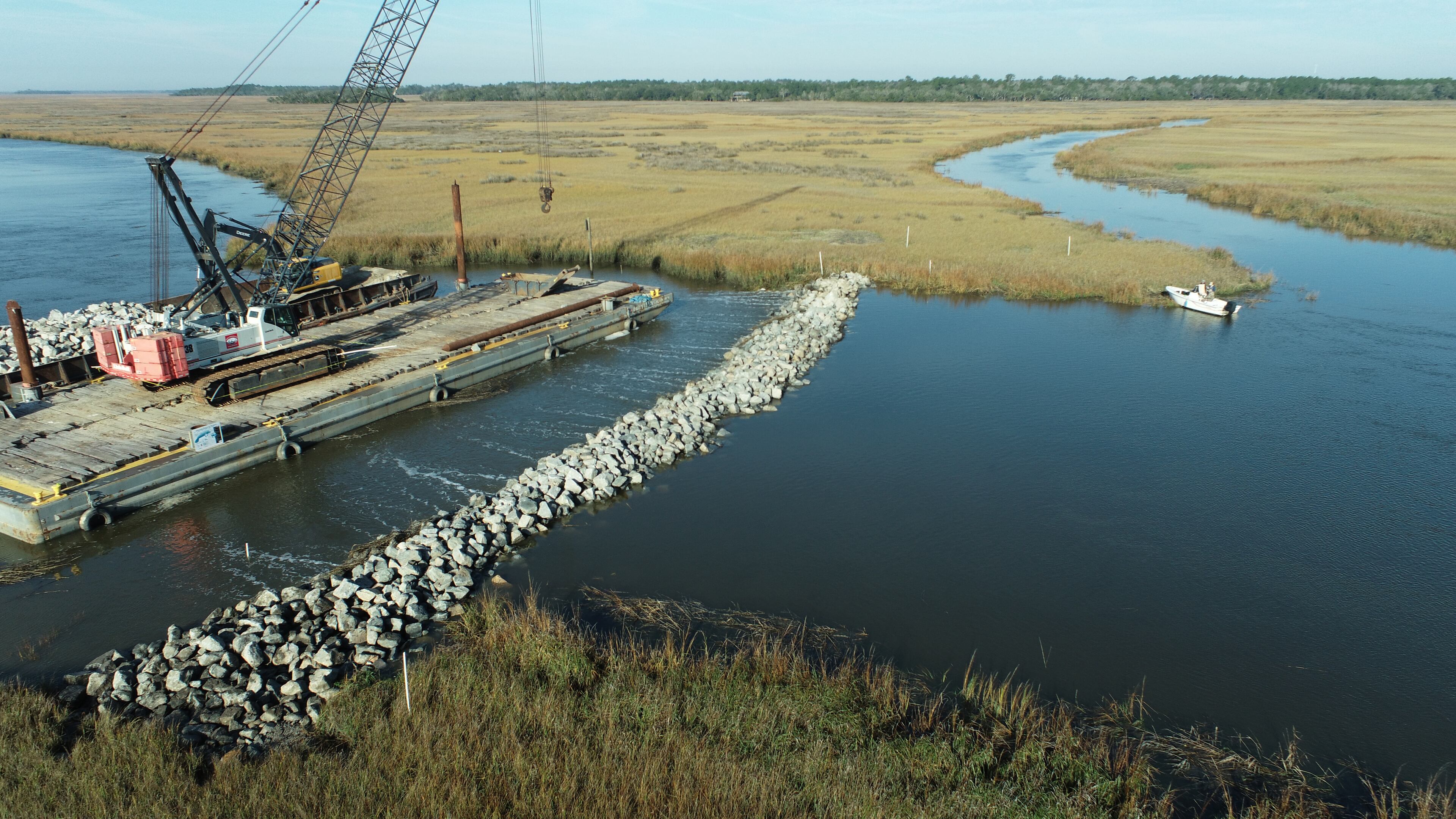The Army Corps of Engineers has blocked off man-made cuts through Georgia's coastal salt marsh, restoring the natural flow of water.