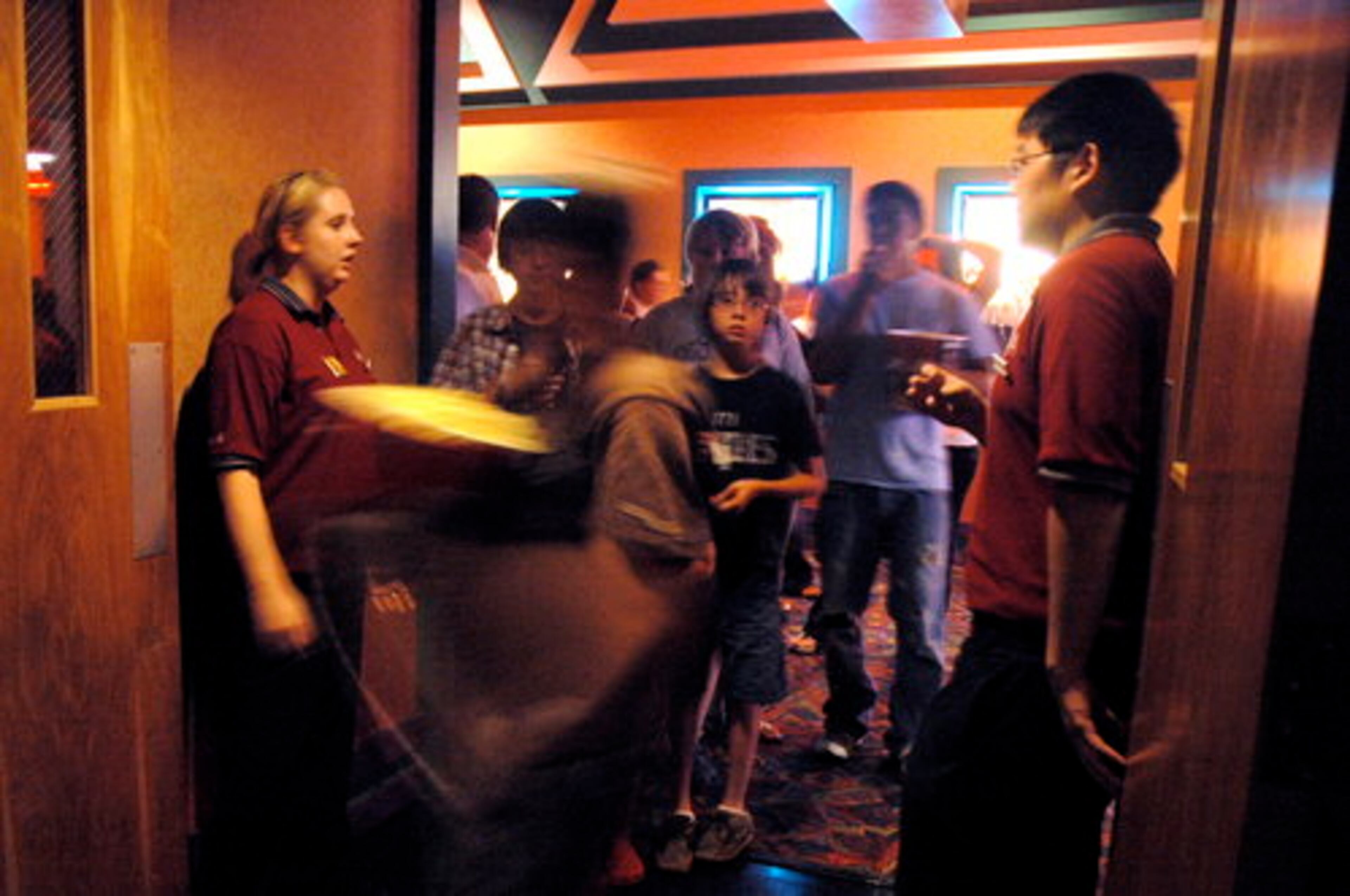 FANS PRESENT their ticket stubs to get in.