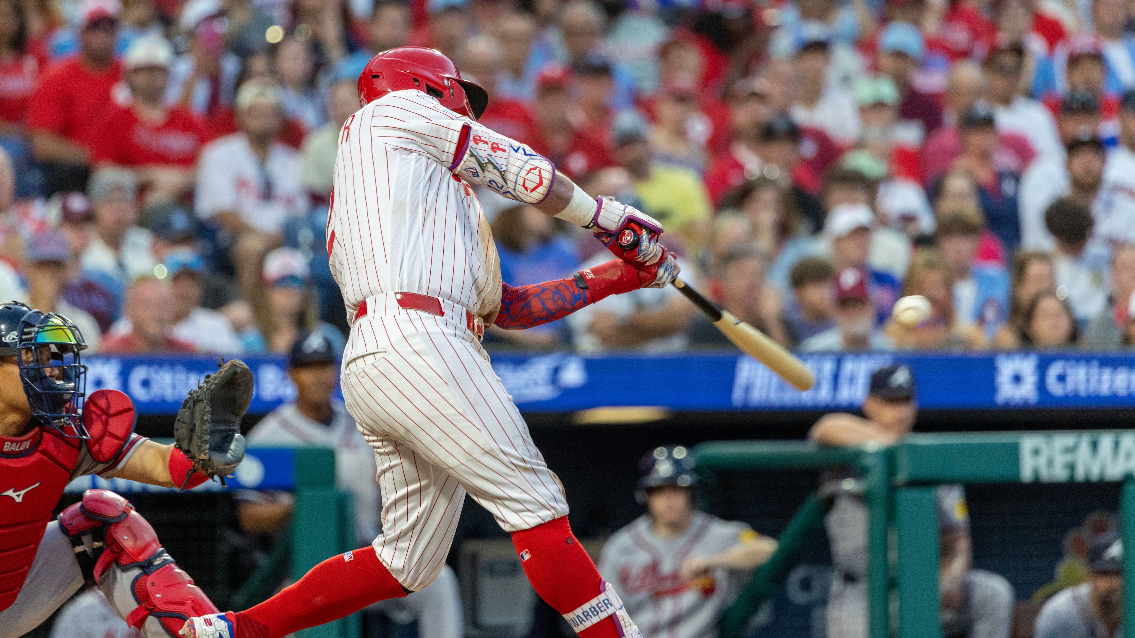 Philadelphia Phillies designated hitter Kyle Schwarber hits a solo home run during the fourth inning of a baseball game against the Atlanta Braves, Saturday, Sept. 5, 2026, in Philadelphia. (AP Photo/Laurence Kesterson)