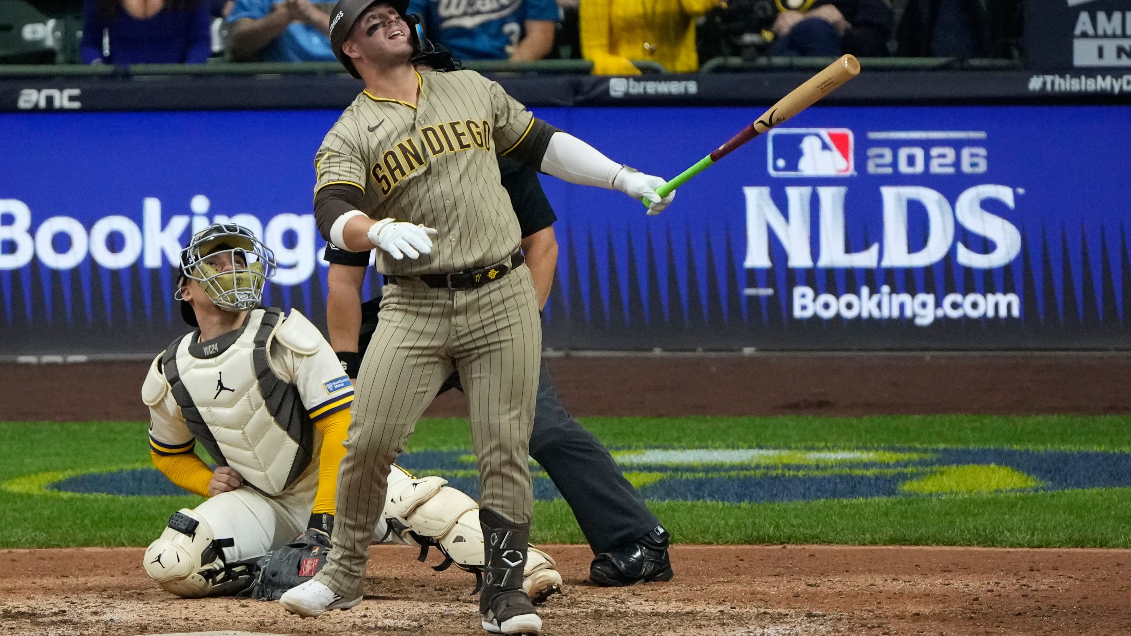 San Diego Padres' Ty France watches his ball hit a cable near the roof of American Family Field during the ninth inning of Game 1 of a National League Divisional baseball playoff series Sunday, Oct. 4, 2026, in Milwaukee. (AP Photo/Chris Carlson)