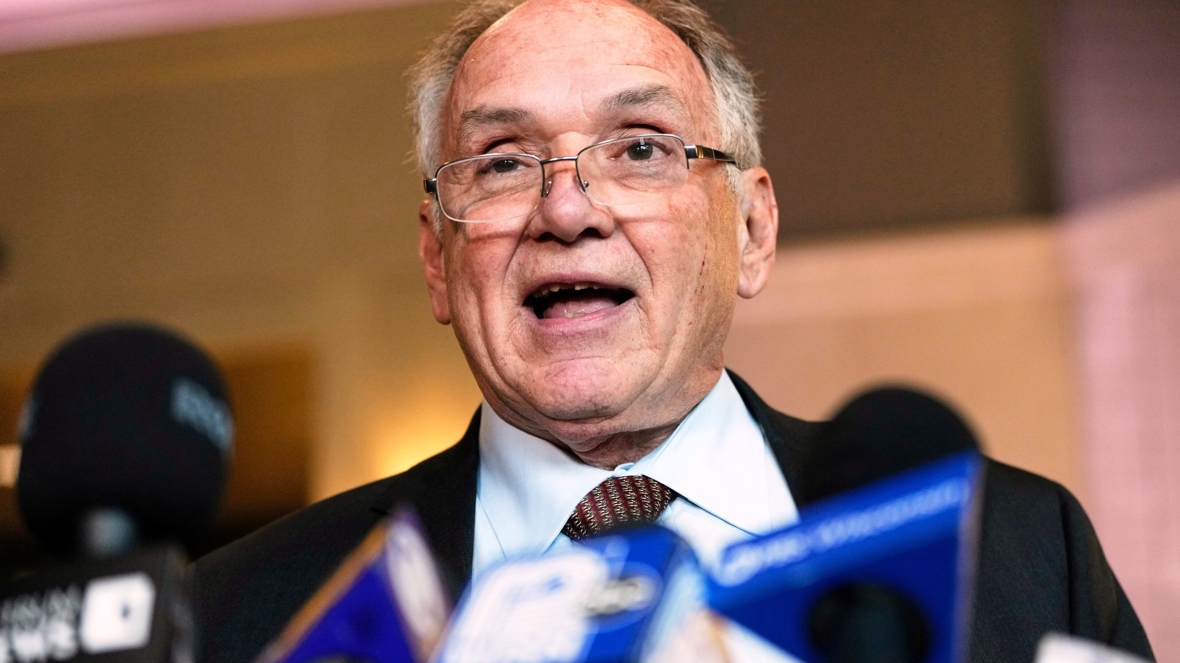 FILE - Jim Troupis reads a statement after his court appearance outside a Dane County courtroom Dec. 12, 2024, in Madison, Wis. (AP Photo/Morry Gash, File)