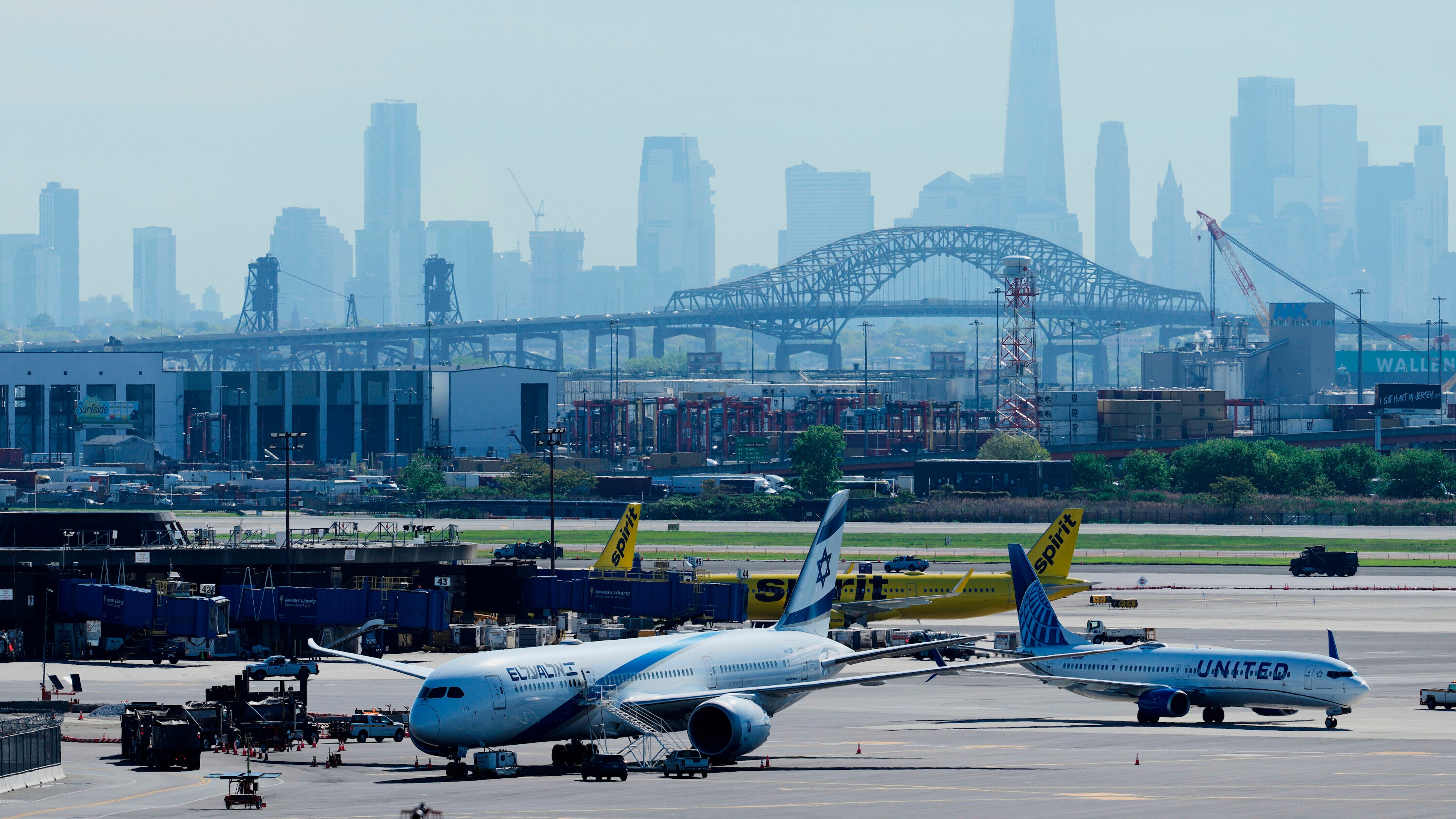 FILE - The New York City skyline is seen behind Newark Liberty International Airport in Newark, N.J., Wednesday, May 7, 2025. (AP Photo/Seth Wenig,File)