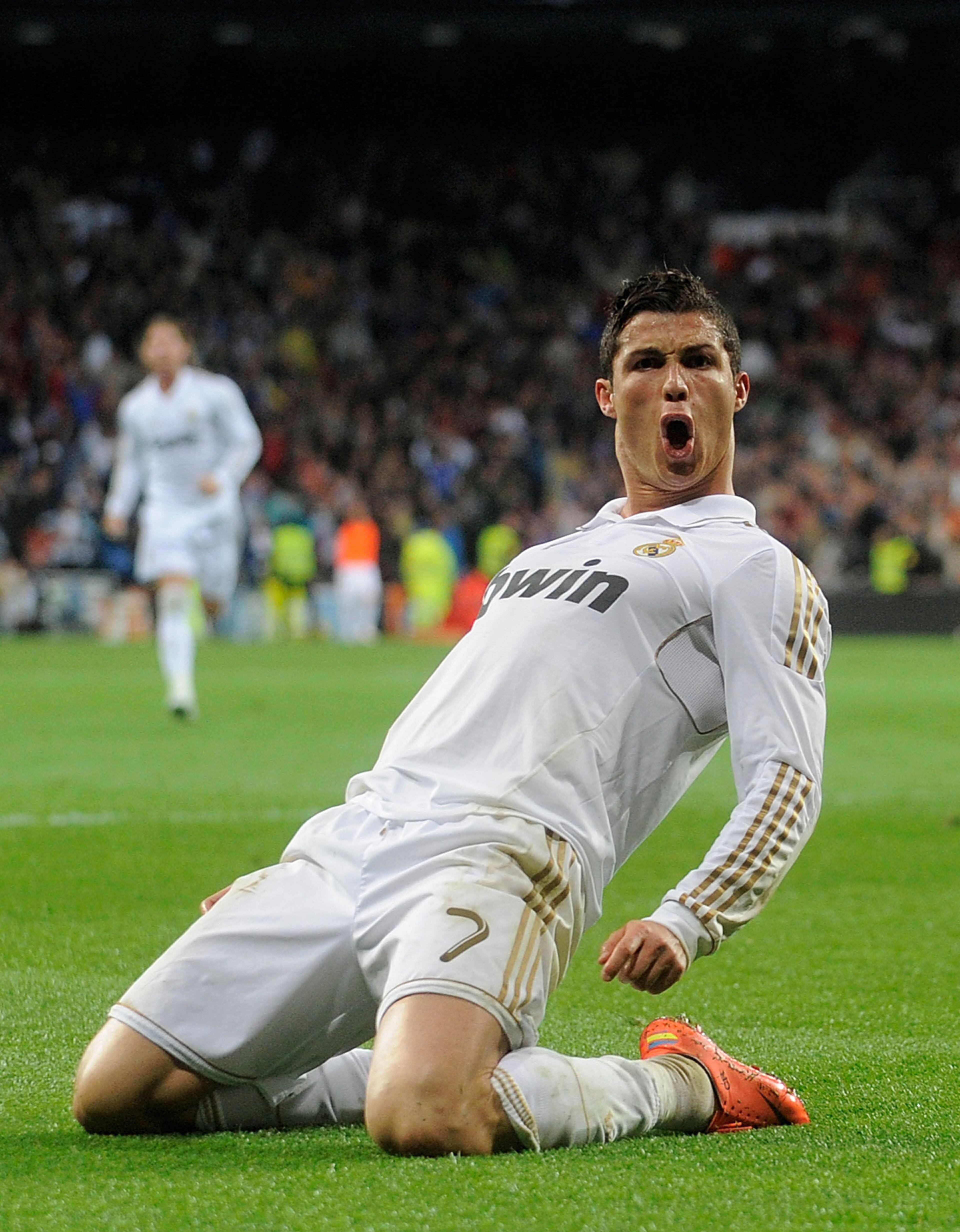 Cristiano Ronaldo of Real Madrid CF celebrates after scoring his team's second goal during the La Liga match between Real Madrid CF and Real Sporting de Gijon on April 14, 2012, in Madrid, Spain.
