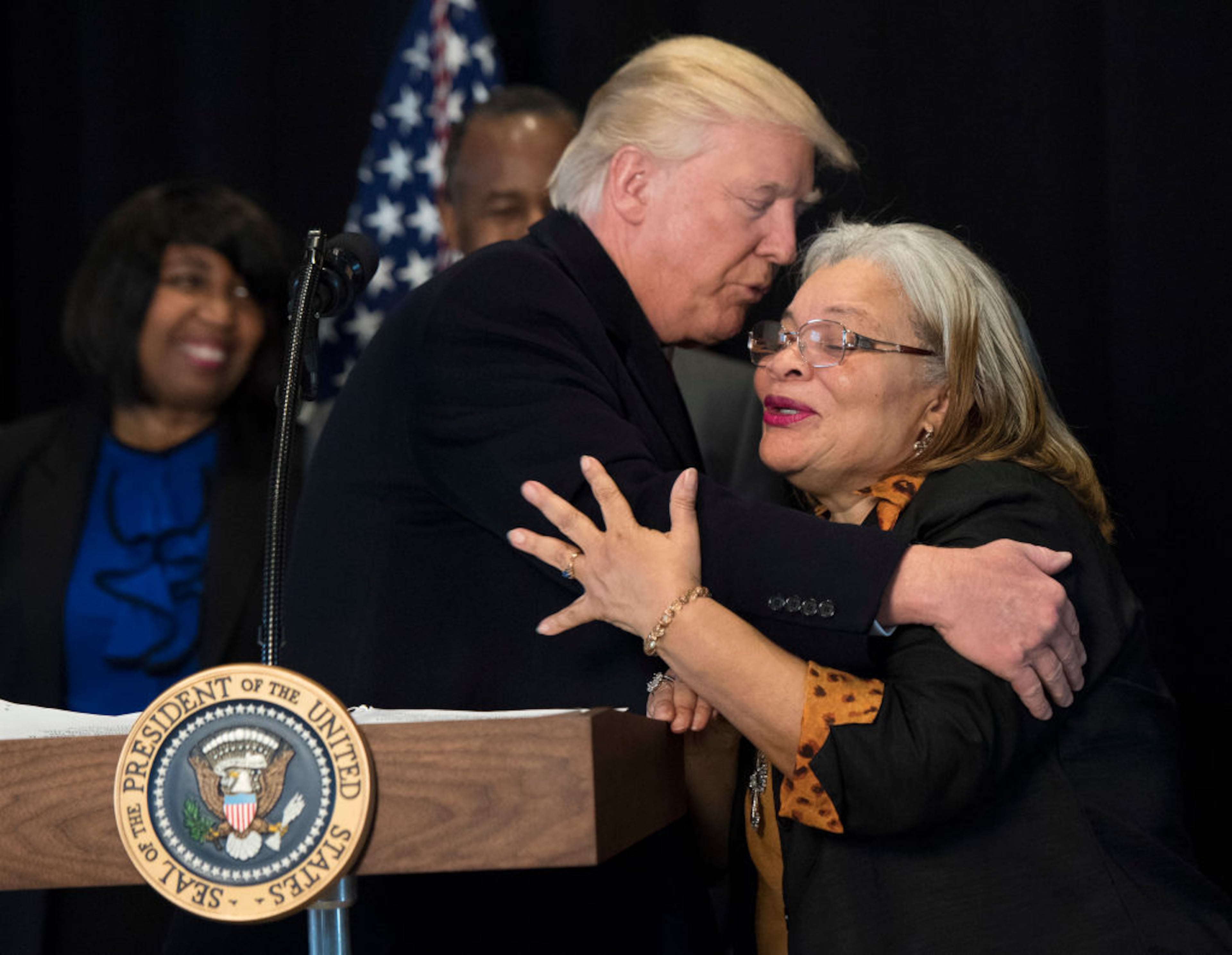WASHINGTON, DC - FEBRUARY 21: (AFP OUT) President Donald Trump hugs Alveda King, niece of Martin Luther King Jr., as he delivers remarks after touring the Smithsonian National Museum of African American History & Culture on February 21, 2017 in Washington, DC. (Photo by Kevin Dietsch - Pool/Getty Images)
