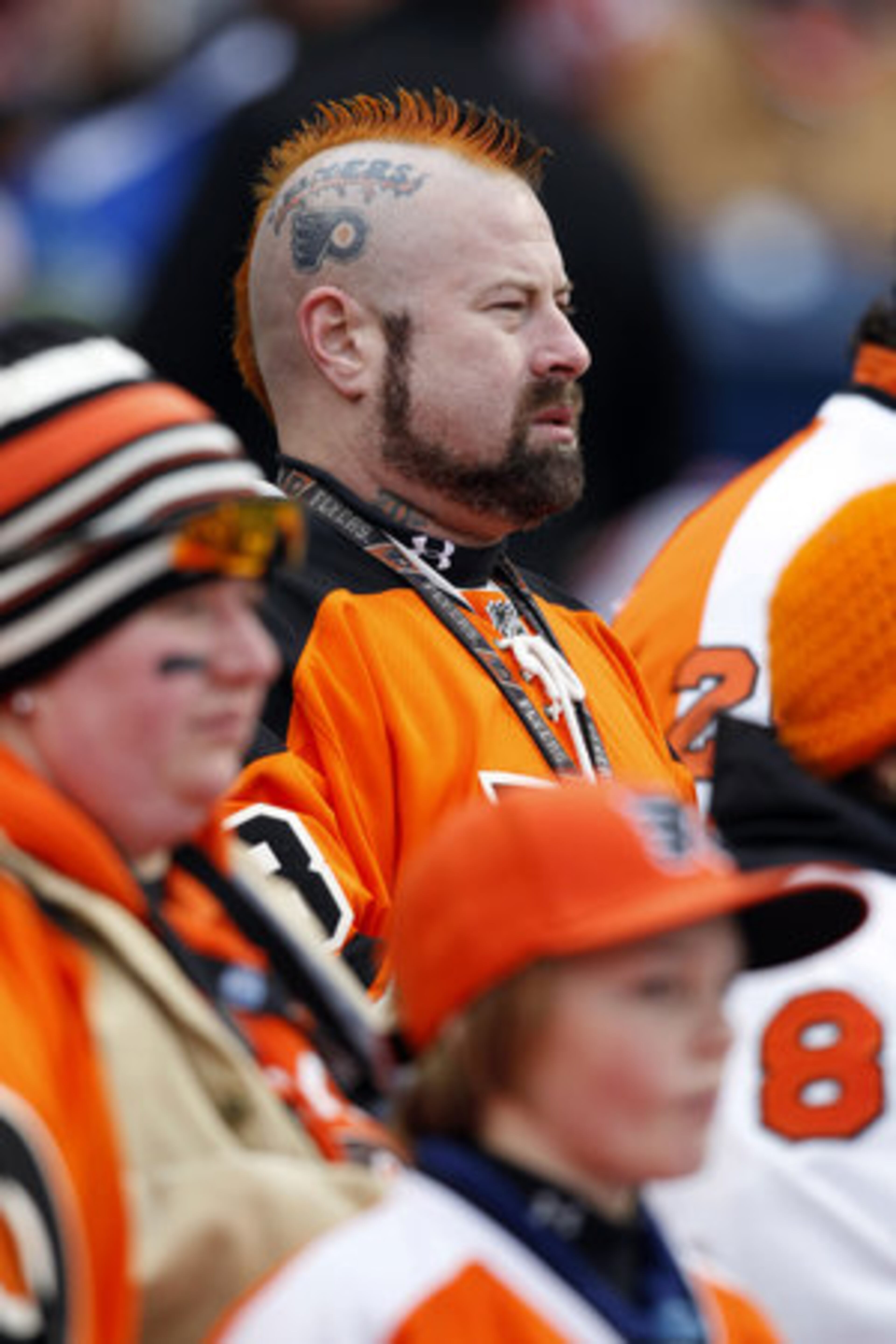 Philadelphia Flyers' fan Eric Rothstein watches from the stands before the NHL Winter Classic hockey game between the Philadelphia Flyers and the New York Rangers, Monday, Jan. 2, 2012, in Philadelphia.