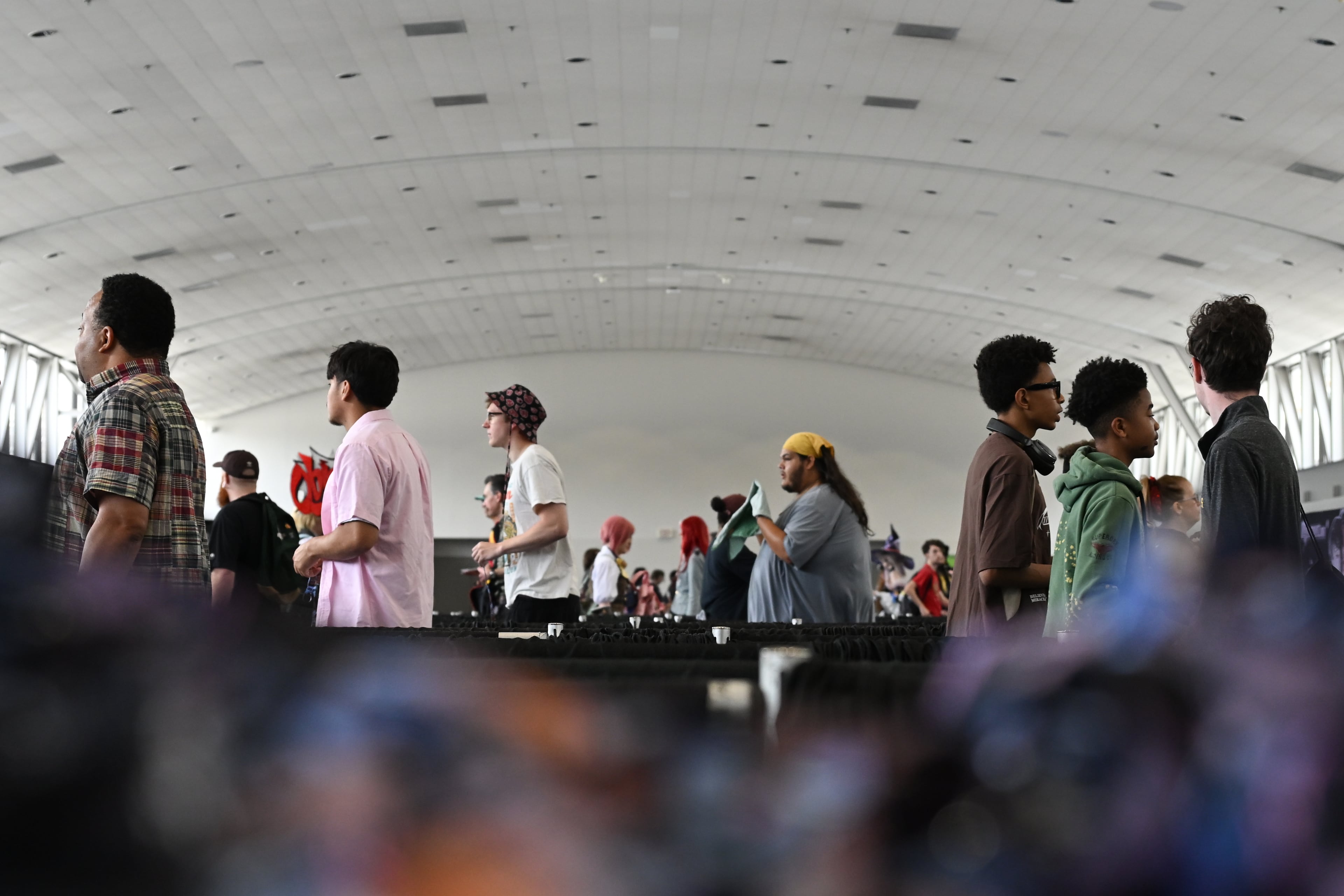 Attendees wait to enter MomoCon at the Georgia World Congress Center in Atlanta on Friday, May 22, 2026. (Tyler Sun for the AJC)