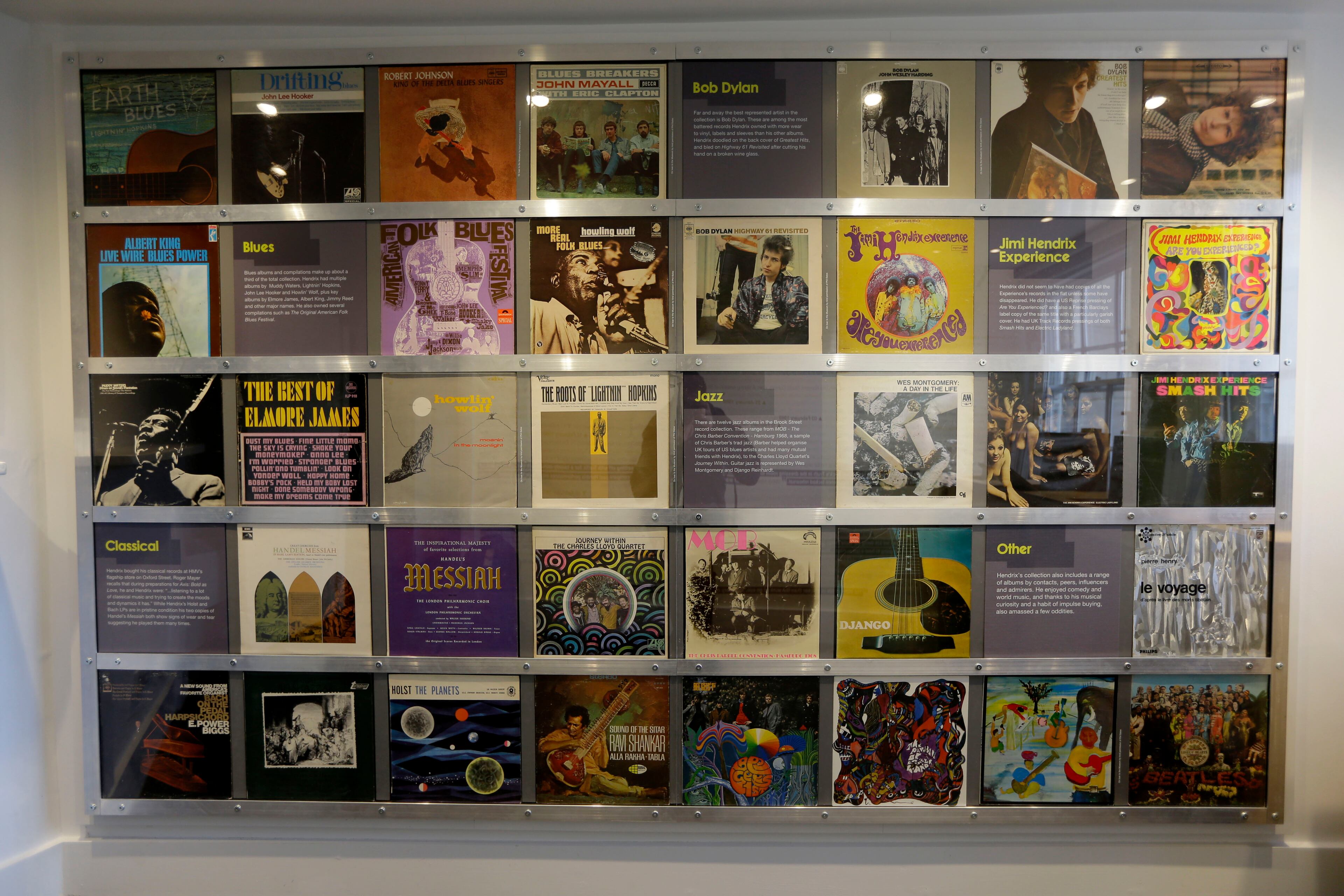 Record covers of albums U.S. musician Jimi Hendrix owned or made are displayed in exhibition space at his former central London flat, at 23 Brook Street, Monday, Feb. 8, 2016. The flat where Hendrix lived in 1968 and '69 opens to the public as a permanent exhibition on February 10 with the bedroom containing items sourced or crafted to replicate how it would have looked when he lived there. (AP Photo/Matt Dunham)